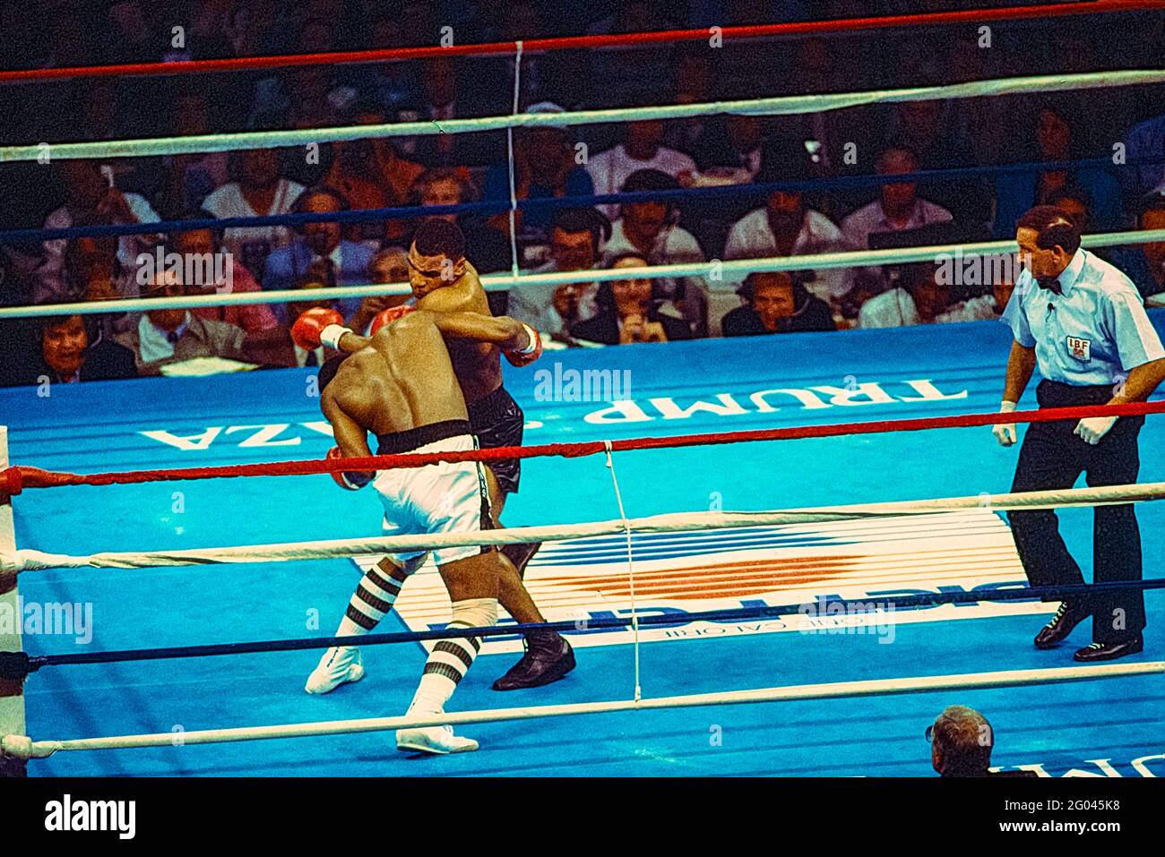 Mike Tyson vs. Michael Spinks in heavyweight championship title fight where Tyson won in 91