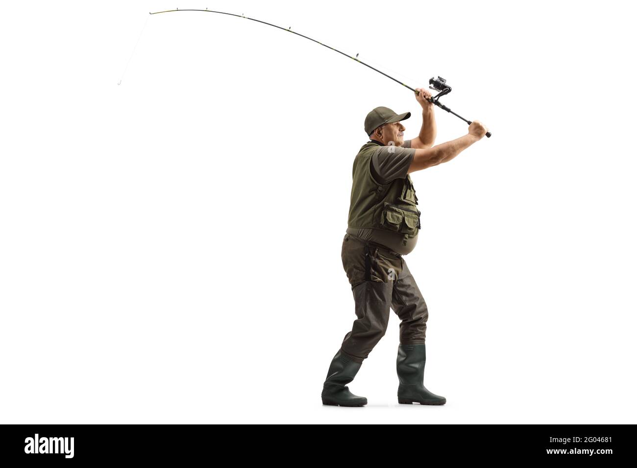 Full length profile shot of a fisherman throwing a fishing rod isolated