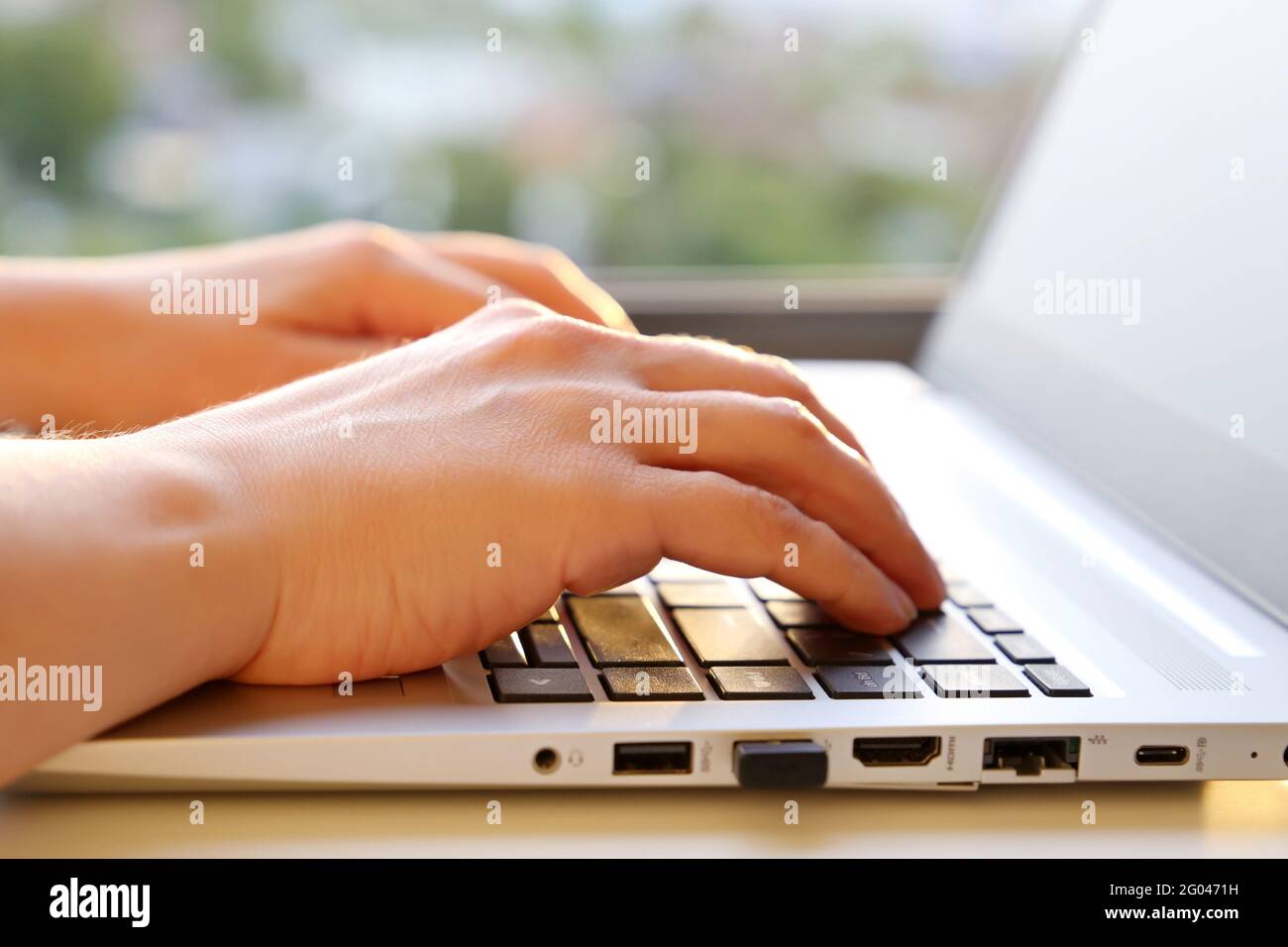 Hands typing text in keyboard hi-res stock photography and images - Alamy