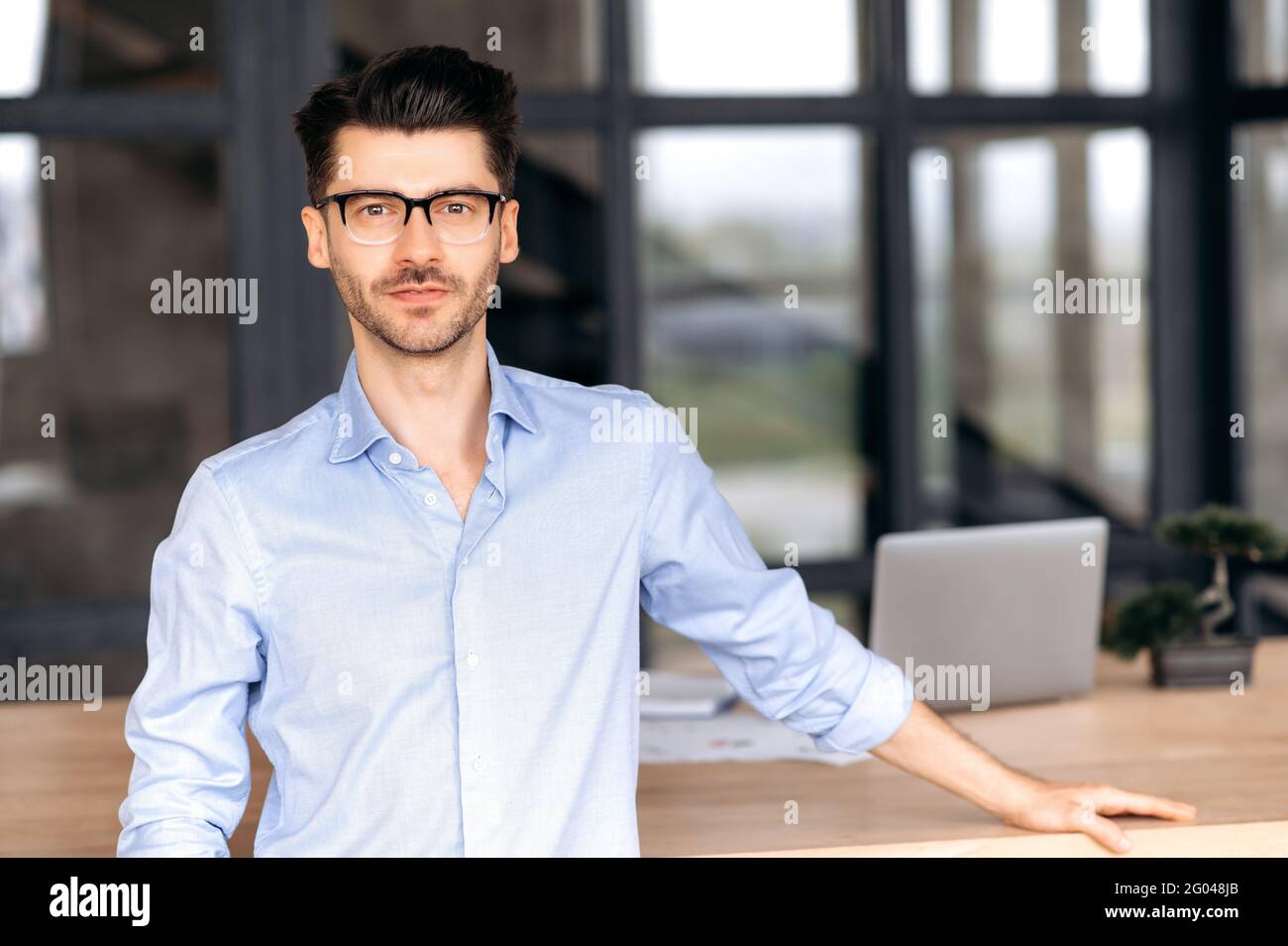 Hand man resting on table hi-res stock photography and images - Alamy