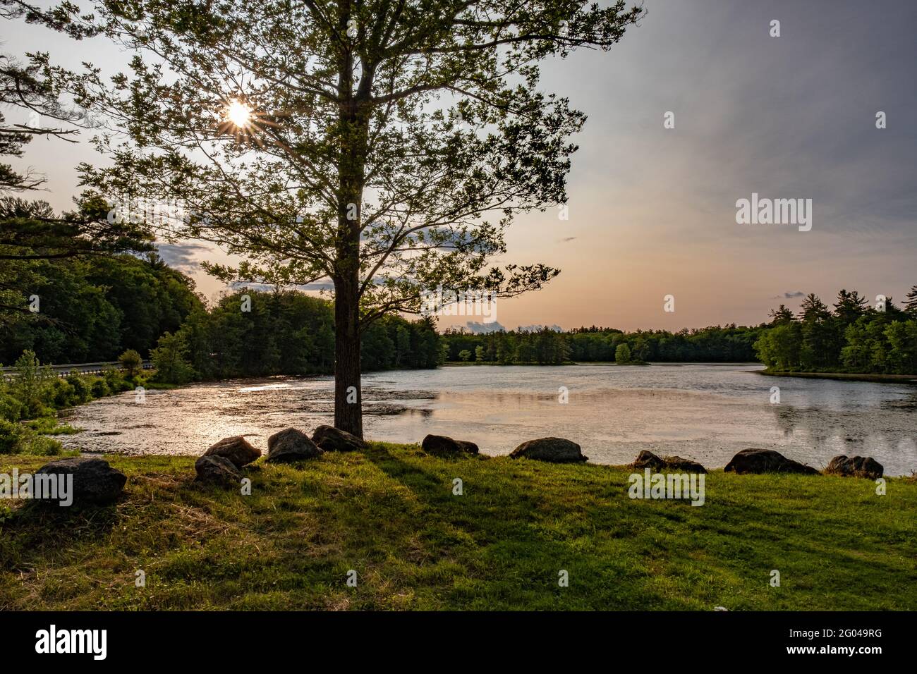 Harvard Pond in Petersham, Massachusetts late in the afternoon Stock