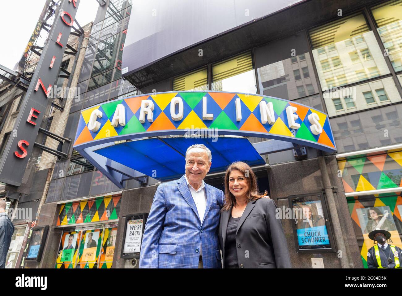 New York, United States. 31st May, 2021. U. S. Senator Charles Schumer and Caroline Hirsch pose outside of Carolines on Broadway comedy club after re-opening ceremony. Senator Charles Schumer lauded Safe our Stages (SOS) bill passed by Senate to help cultural venues to survive pandemic. He also cracked few jokes saying it is comedy club he does not have a choice but say them. (Photo by Lev Radin/Pacific Press) Credit: Pacific Press Media Production Corp./Alamy Live News Stock Photo