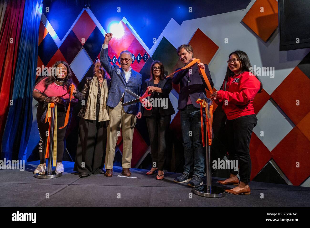 New York, United States. 31st May, 2021. Comedian Yamaneika Saunders, Manhattan Borough President Gale Brewer, U. S. Senator Charles Schumer, Caroline Hirsch, State Senator Brad Hoylman, guest cut ribbon with others at Carolines on Broadway comedy club re-opening after pandemic ceremony. Senator Charles Schumer lauded Safe our Stages (SOS) bill passed by Senate to help cultural venues to survive pandemic. He also cracked few jokes saying it is comedy club he does not have a choice but say them. (Photo by Lev Radin/Pacific Press) Credit: Pacific Press Media Production Corp./Alamy Live News Stock Photo