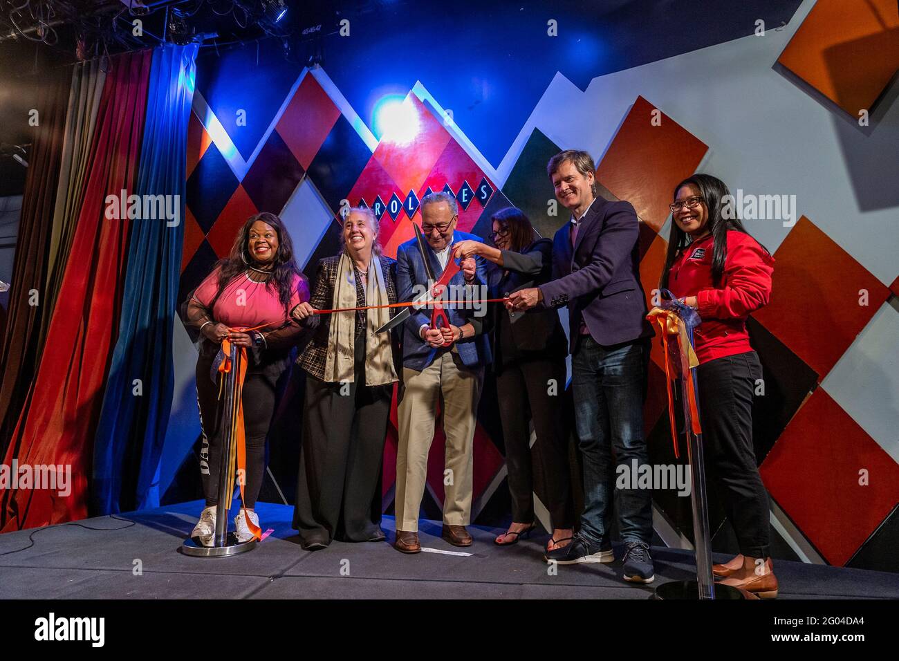 New York, United States. 31st May, 2021. Comedian Yamaneika Saunders, Manhattan Borough President Gale Brewer, U. S. Senator Charles Schumer, Caroline Hirsch, State Senator Brad Hoylman, guest cut ribbon with others at Carolines on Broadway comedy club re-opening after pandemic ceremony. Senator Charles Schumer lauded Safe our Stages (SOS) bill passed by Senate to help cultural venues to survive pandemic. He also cracked few jokes saying it is comedy club he does not have a choice but say them. (Photo by Lev Radin/Pacific Press) Credit: Pacific Press Media Production Corp./Alamy Live News Stock Photo