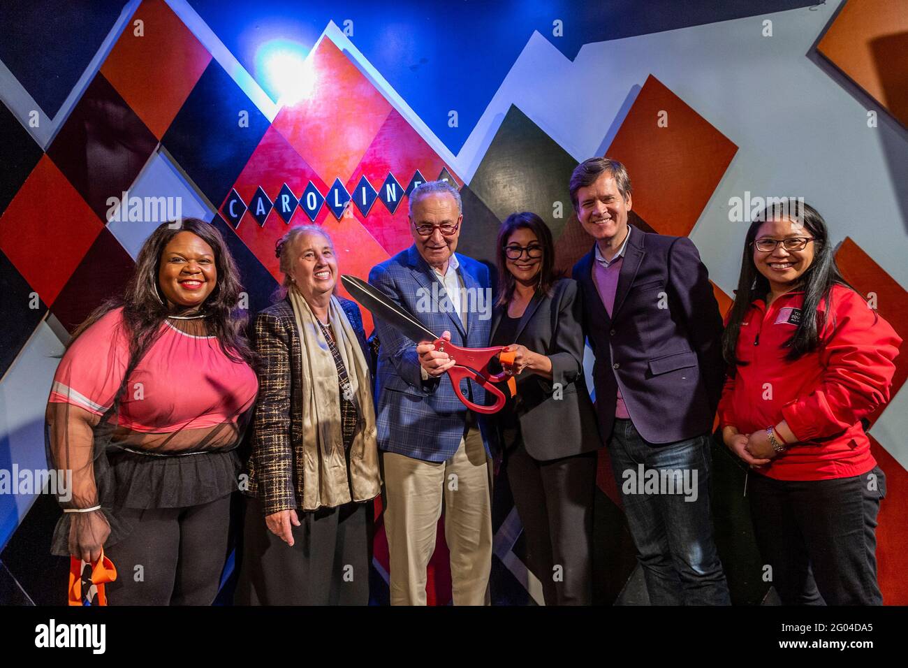 New York, United States. 31st May, 2021. Comedian Yamaneika Saunders, Manhattan Borough President Gale Brewer, U. S. Senator Charles Schumer, Caroline Hirsch, State Senator Brad Hoylman, guest cut ribbon with others at Carolines on Broadway comedy club re-opening after pandemic ceremony. Senator Charles Schumer lauded Safe our Stages (SOS) bill passed by Senate to help cultural venues to survive pandemic. He also cracked few jokes saying it is comedy club he does not have a choice but say them. (Photo by Lev Radin/Pacific Press) Credit: Pacific Press Media Production Corp./Alamy Live News Stock Photo