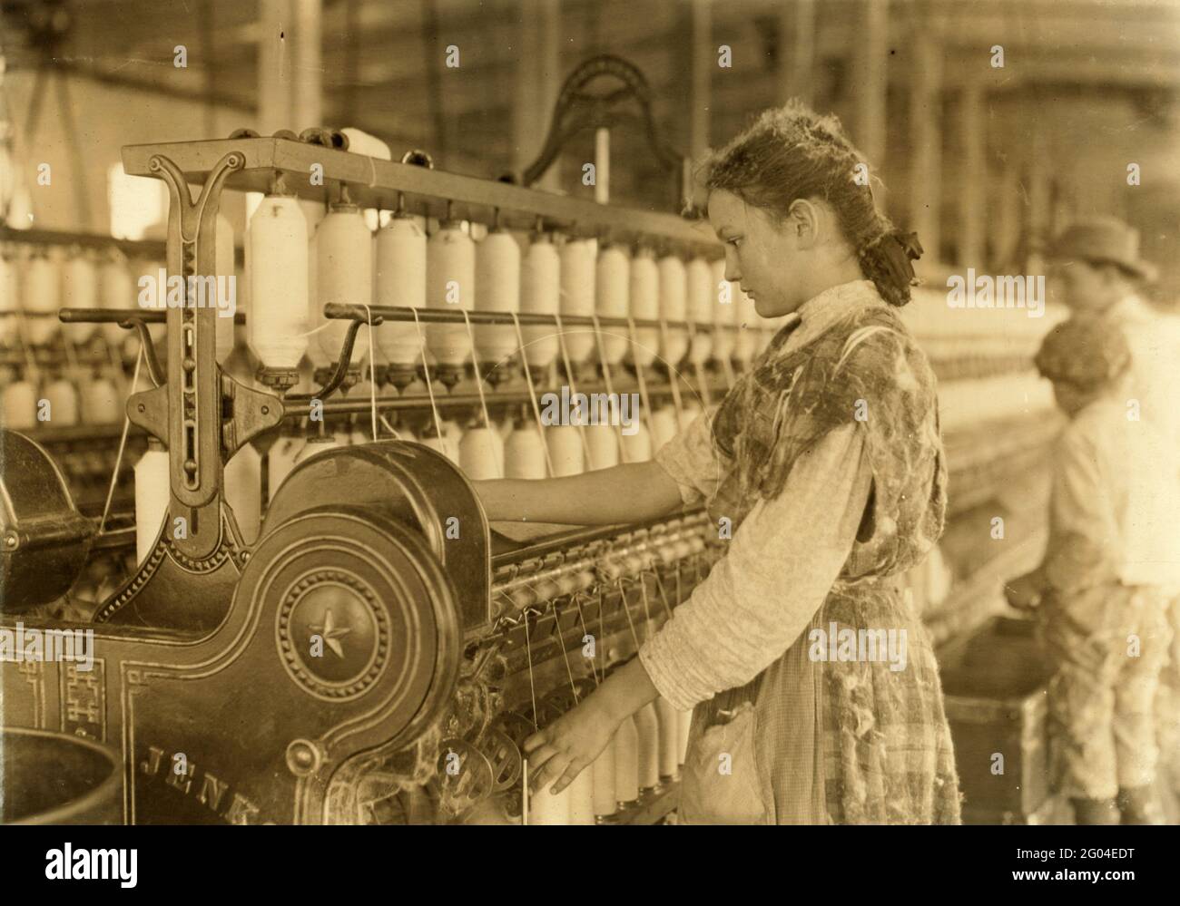 Child Labour: A young girl working as a spinner ina North Carolina cotton mill Stock Photo