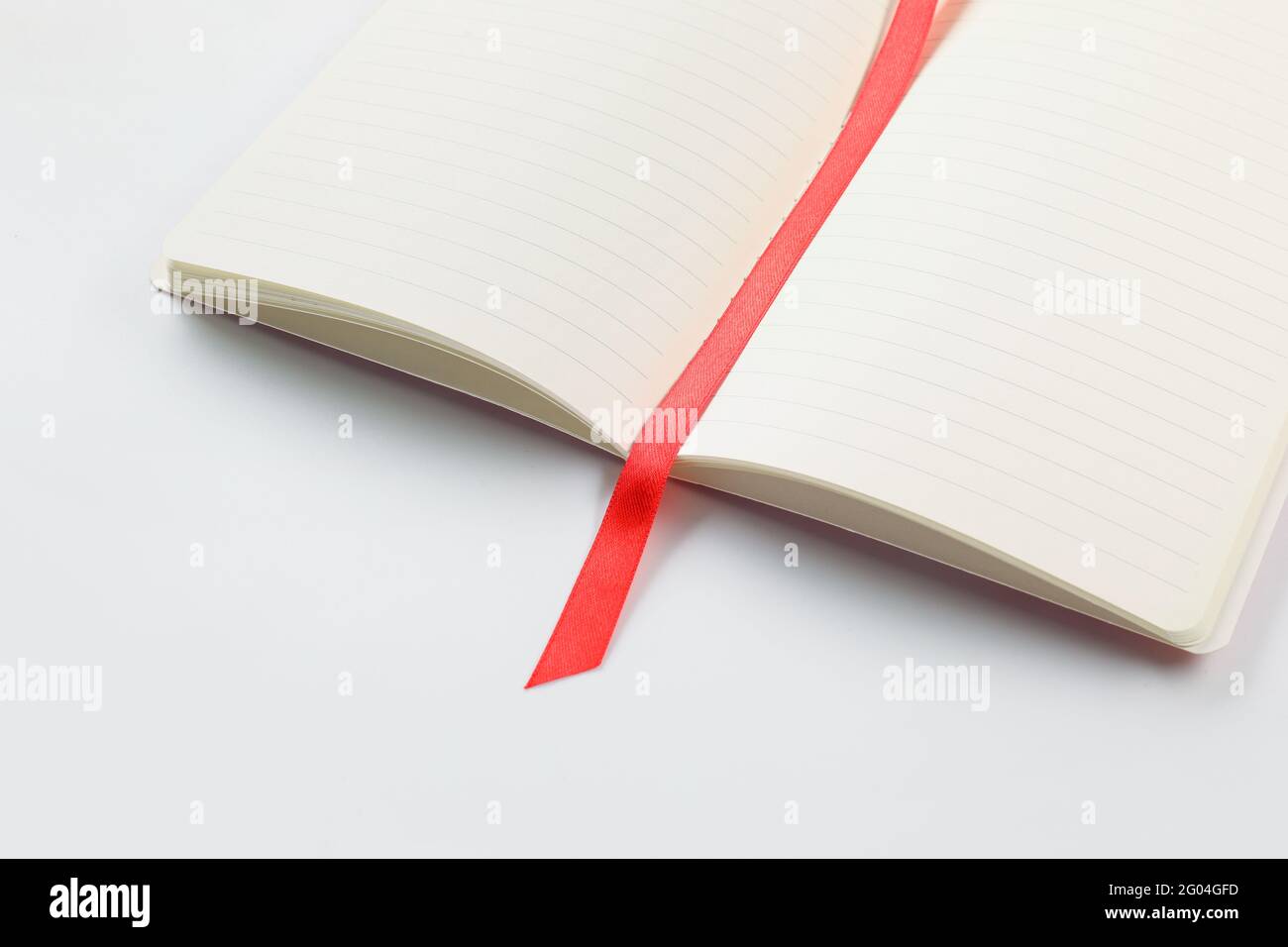Blank notebook with bookmark on white background Stock Photo
