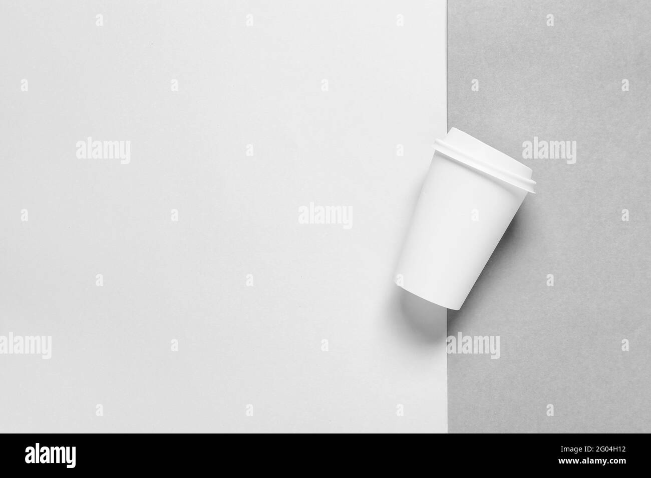 Blank paper cup on grey background Stock Photo - Alamy