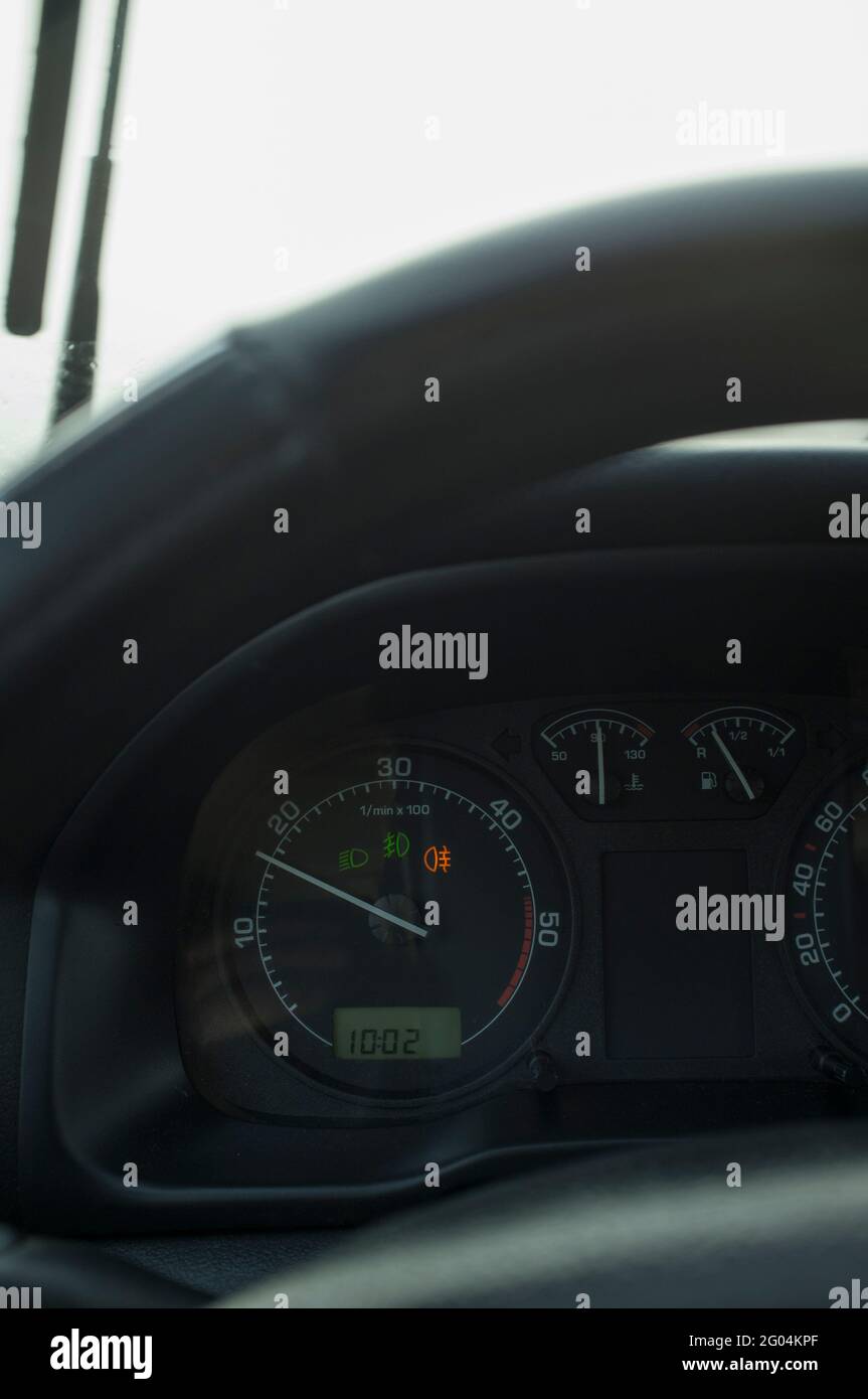 Fog lights indicators at car dashboard. Badweather driving concept