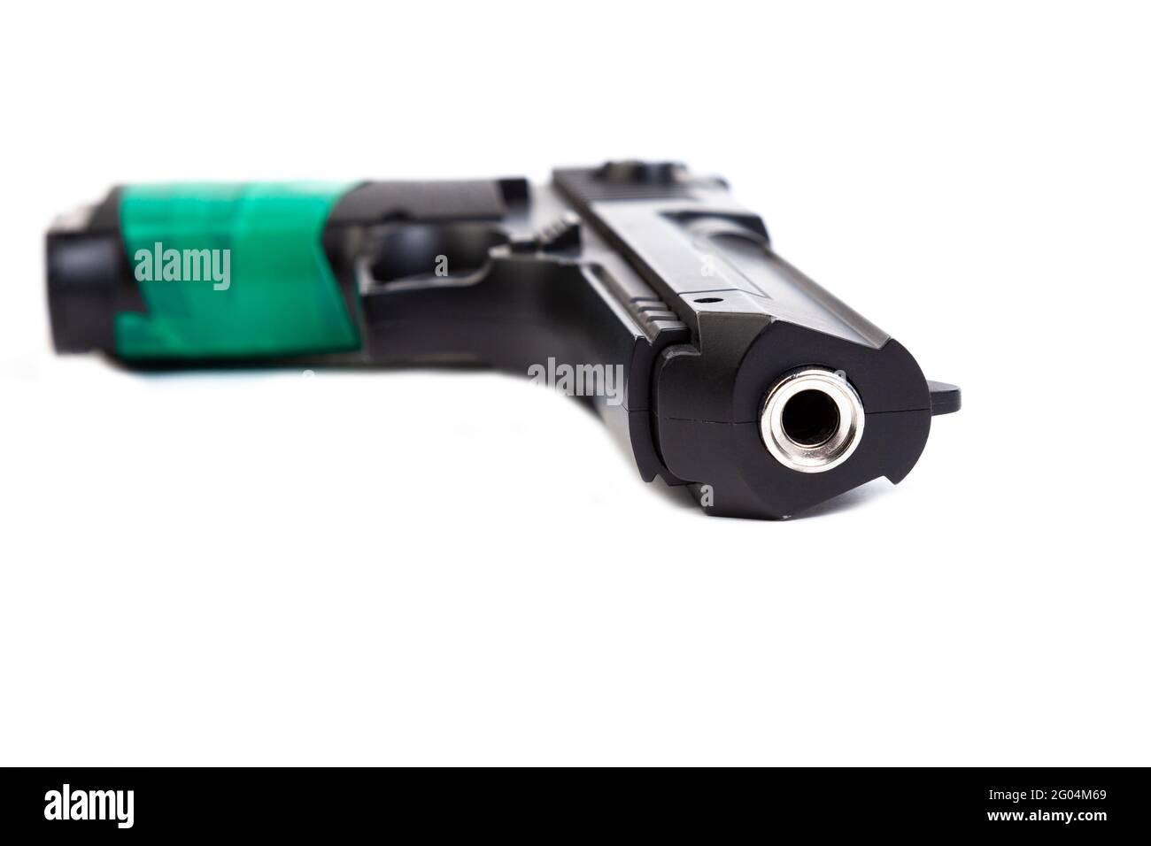 A large black pistol with a handle wrapped in green electrical tape