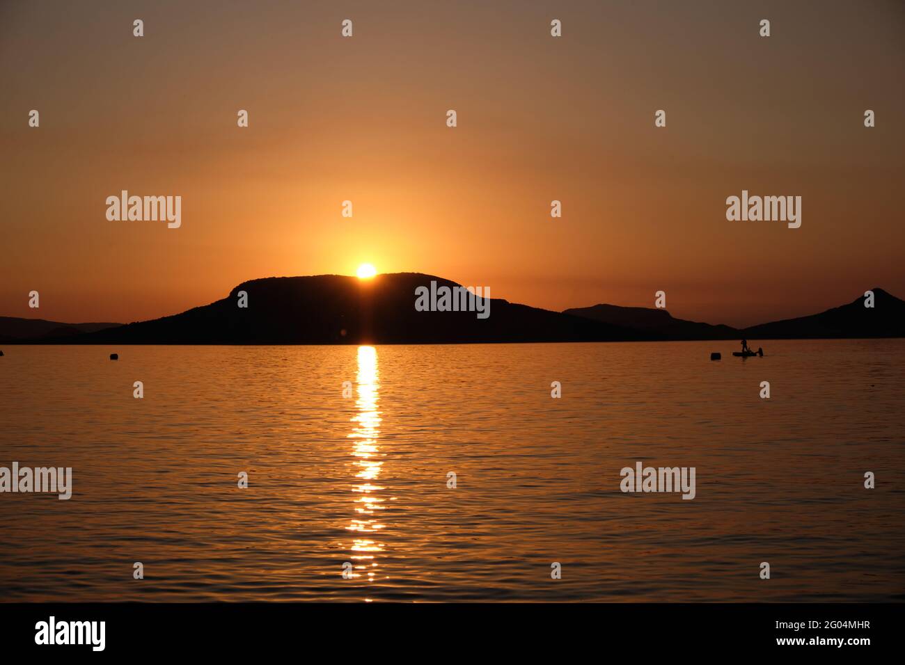 Beautiful view of the stunning sunset sky reflecting in the peaceful ...