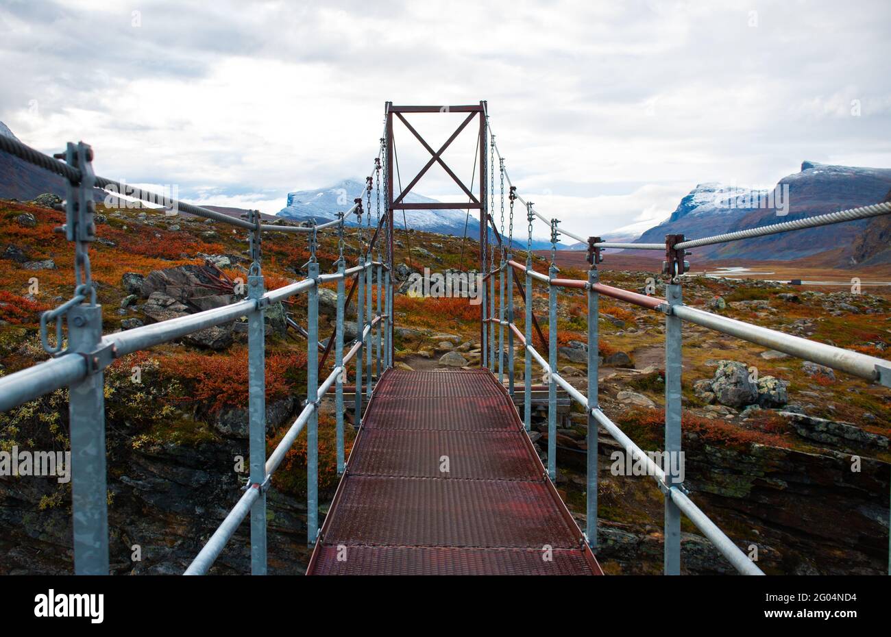 One of the bridges across the streams of Kungsleden trail between Salka and Singi, Lapland, Sweden Stock Photo