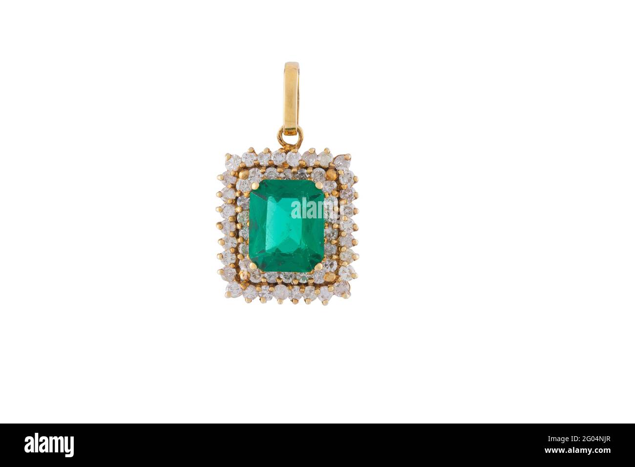 Golden earring with a large emerald set in the middle and small diamonds around it Stock Photo