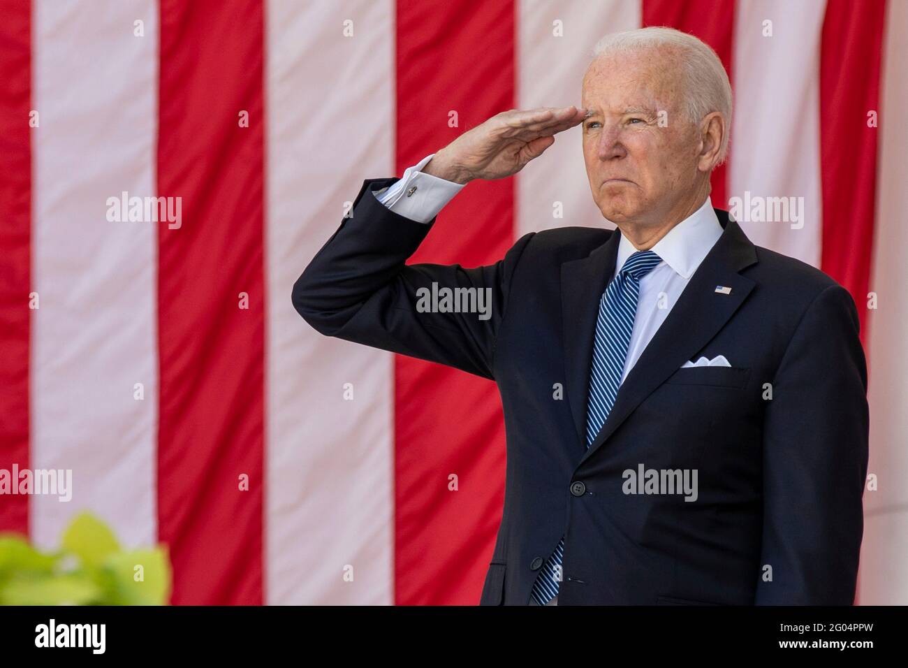 Arlington, United States Of America. 31st May, 2021. U.S President Joe Biden salutes during the annual Memorial Day commemoration in the Memorial Amphitheater at Arlington National Cemetery May 31, 2021 Arlington, Virginia. Credit: Planetpix/Alamy Live News Stock Photo