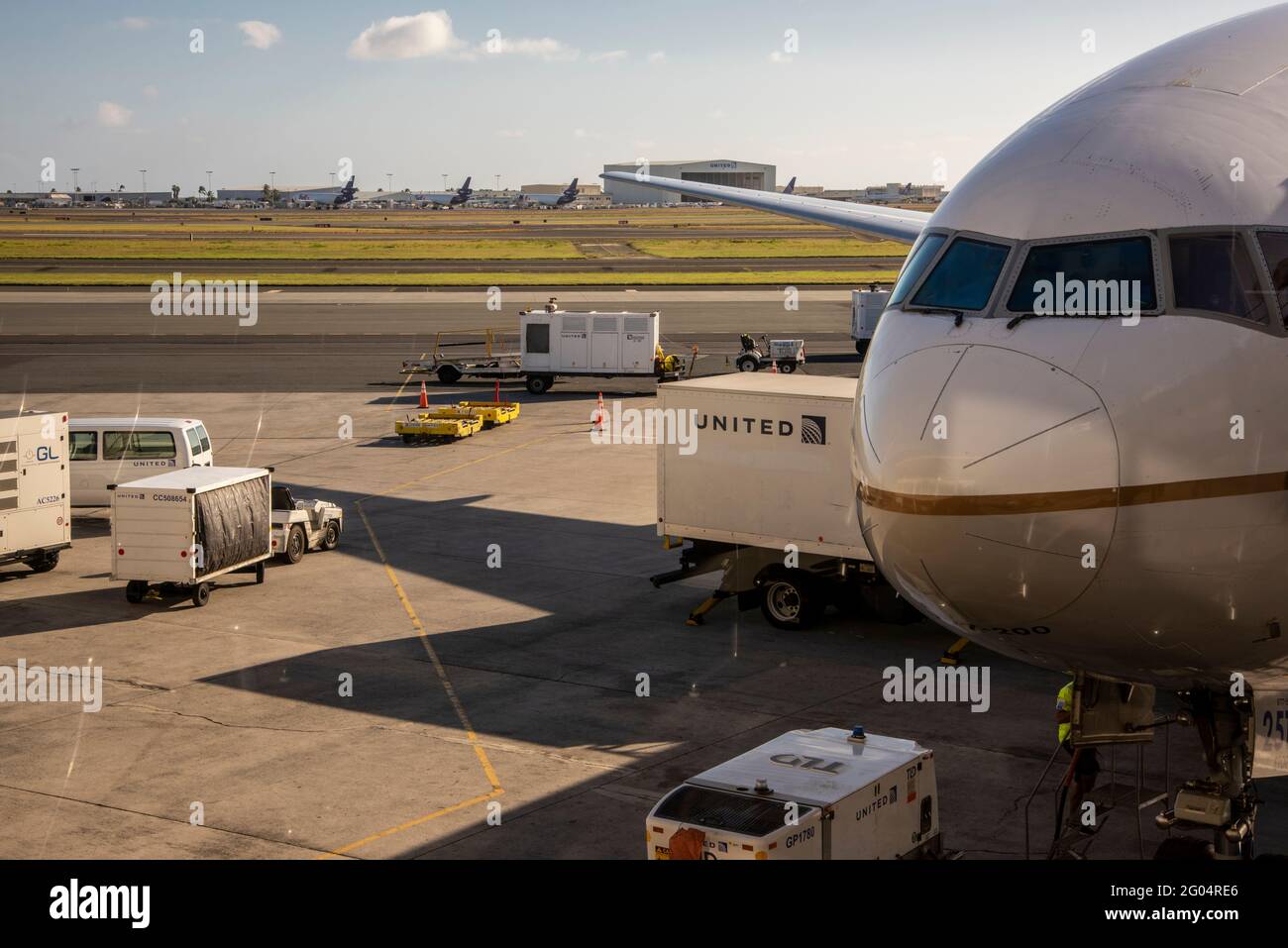 Honolulu, Hawaii. United airlines airplane being fueled and loaded for the next flight at Daniel