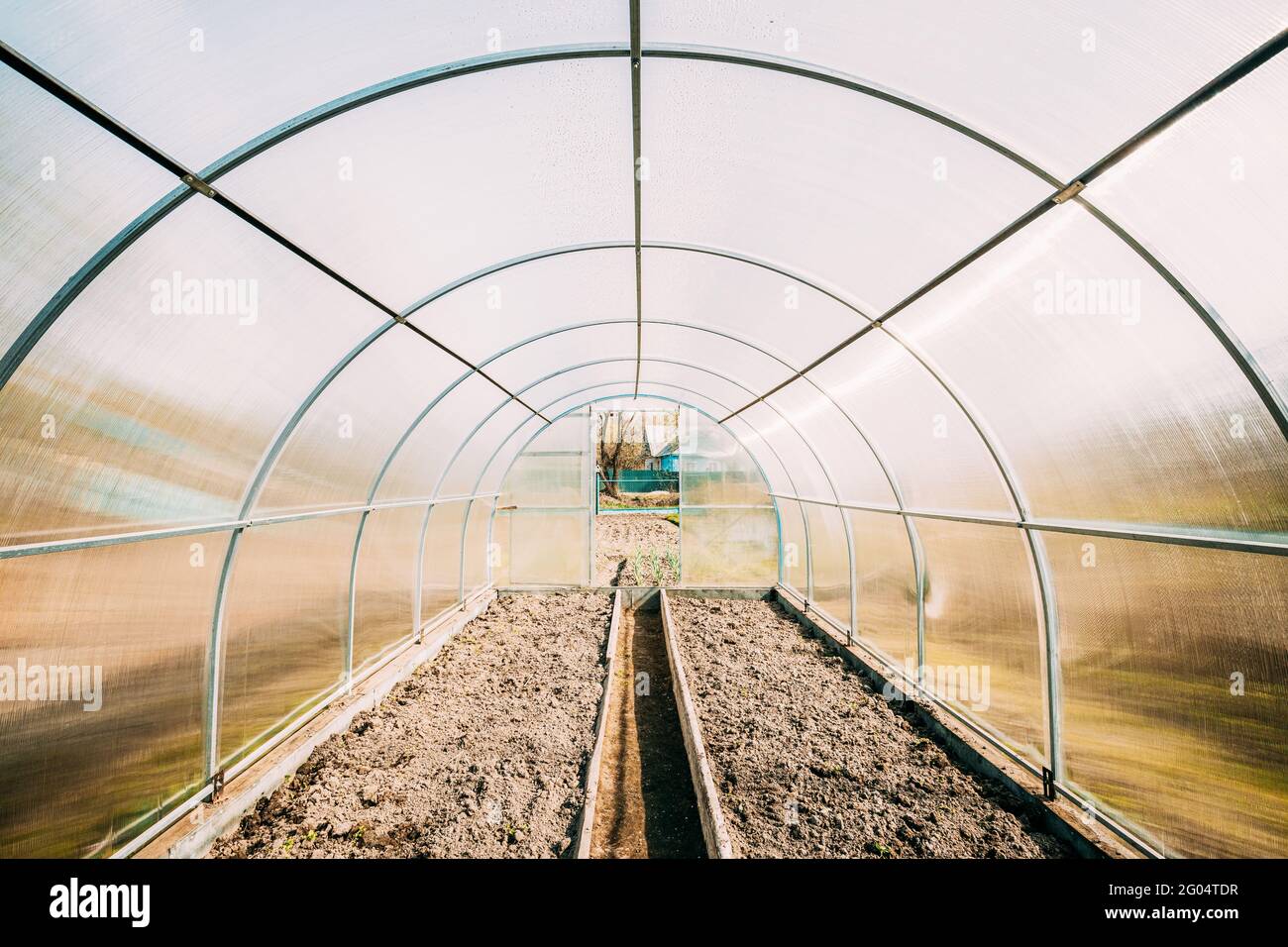 Empty New Greenhouse In Vegetable Garden Or Hothouse Or Greenhouse ...