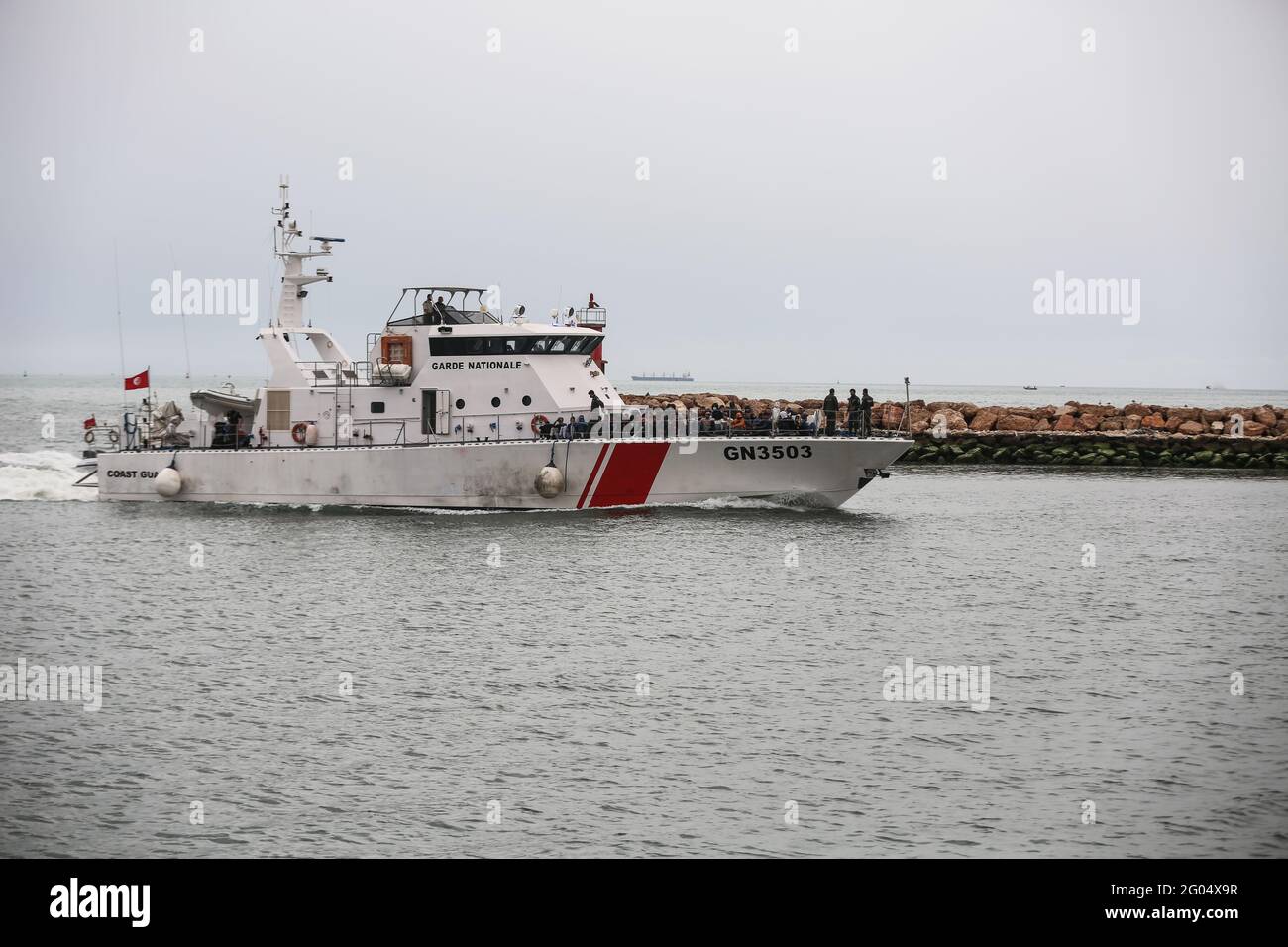 Tunisian Coast Guard vessel enters the district's port after rescuing  dozens of illegal immigrants on May 27, 2021 in the District of Marine  National Guard of the Center, Sfax, Tunisia. Tunisia has