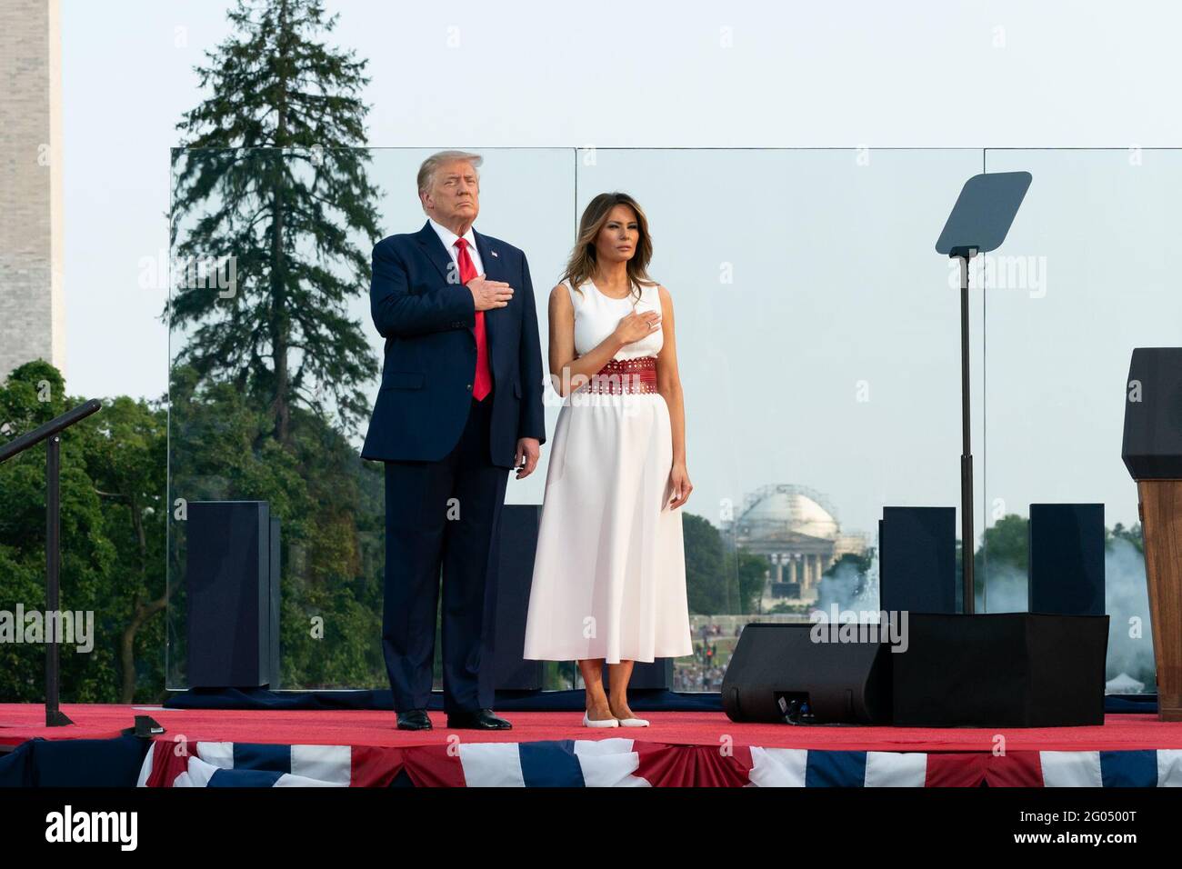 President Donald J. Trump and First Lady Melania Trump place their hands on their heart during the National Anthem at the 2020 Salute to America event Saturday, July 4, 2020, on the South Lawn of the White House Stock Photo