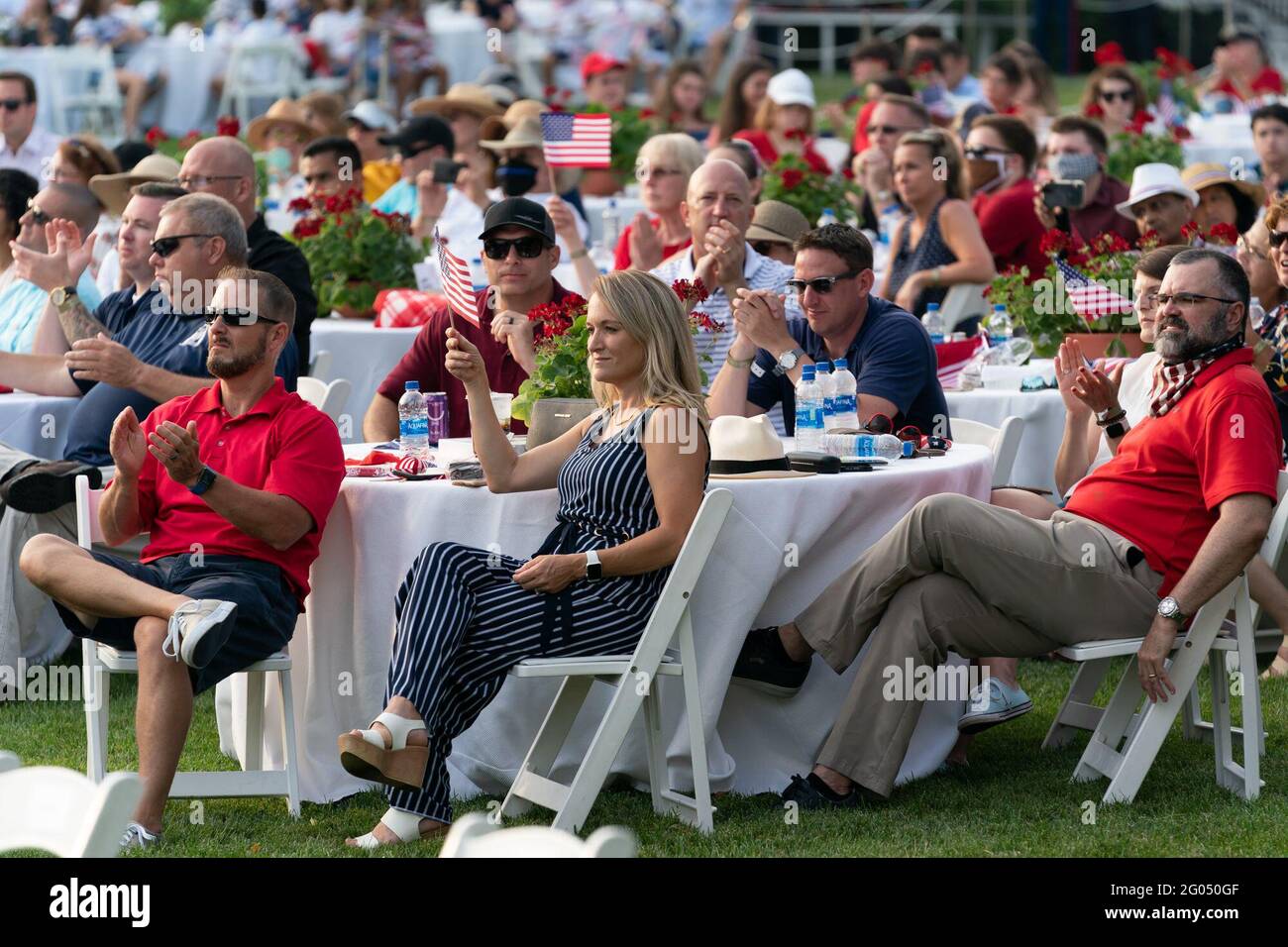 Invited guests are seen on the South Lawn of the White House Saturday evening, July 4, 2020, attending the Salute to America 2020, Fourth of July celebration Stock Photo