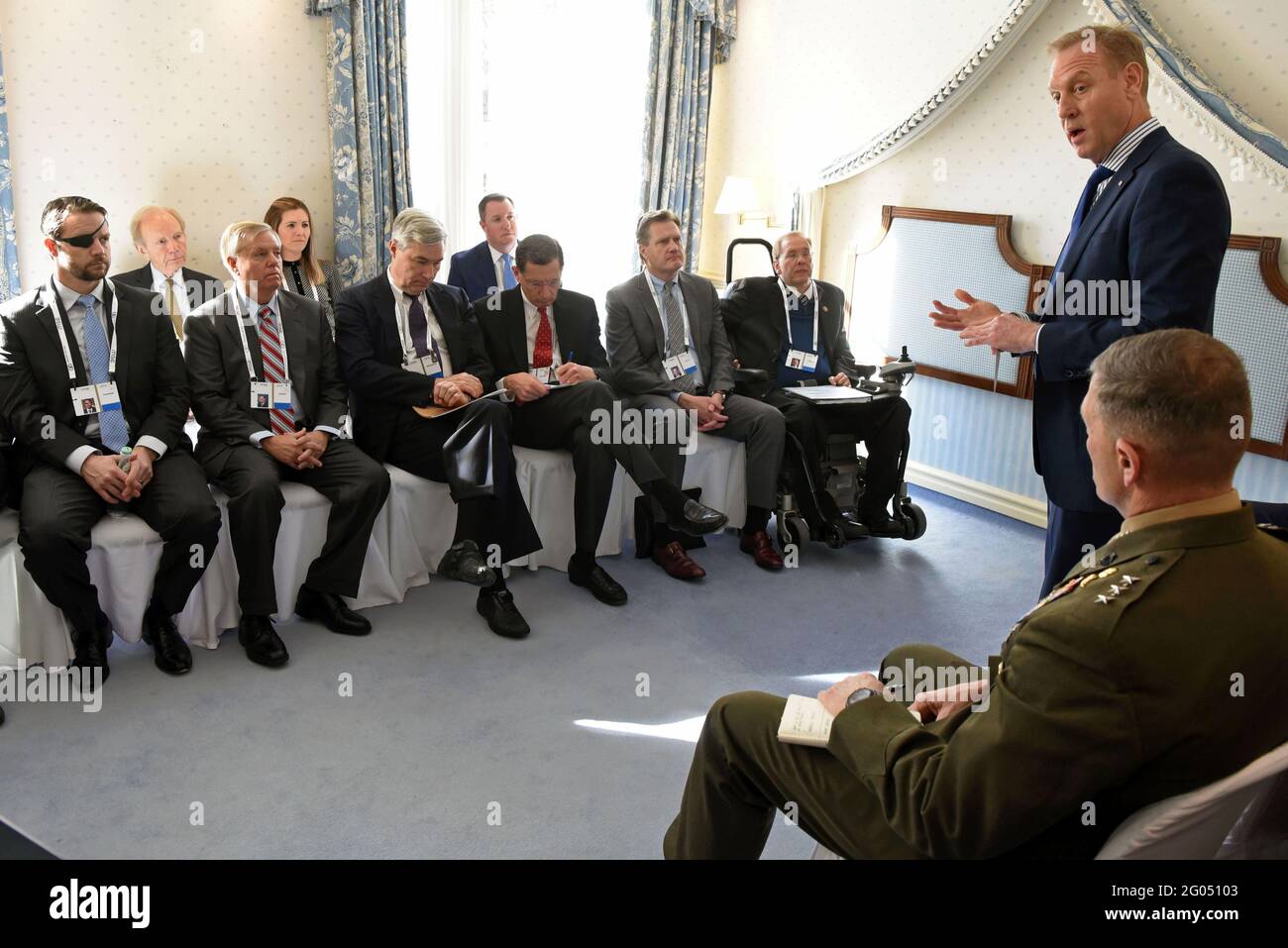 Reportage:   U.S. Acting Secretary of Defense Patrick M. Shanahan meets with a congressional delegation led by U.S. Senator Lindsey Graham, on the sidelines of the Munich Security Conference, Munich, Germany, Feb. 16, 2019. Stock Photo