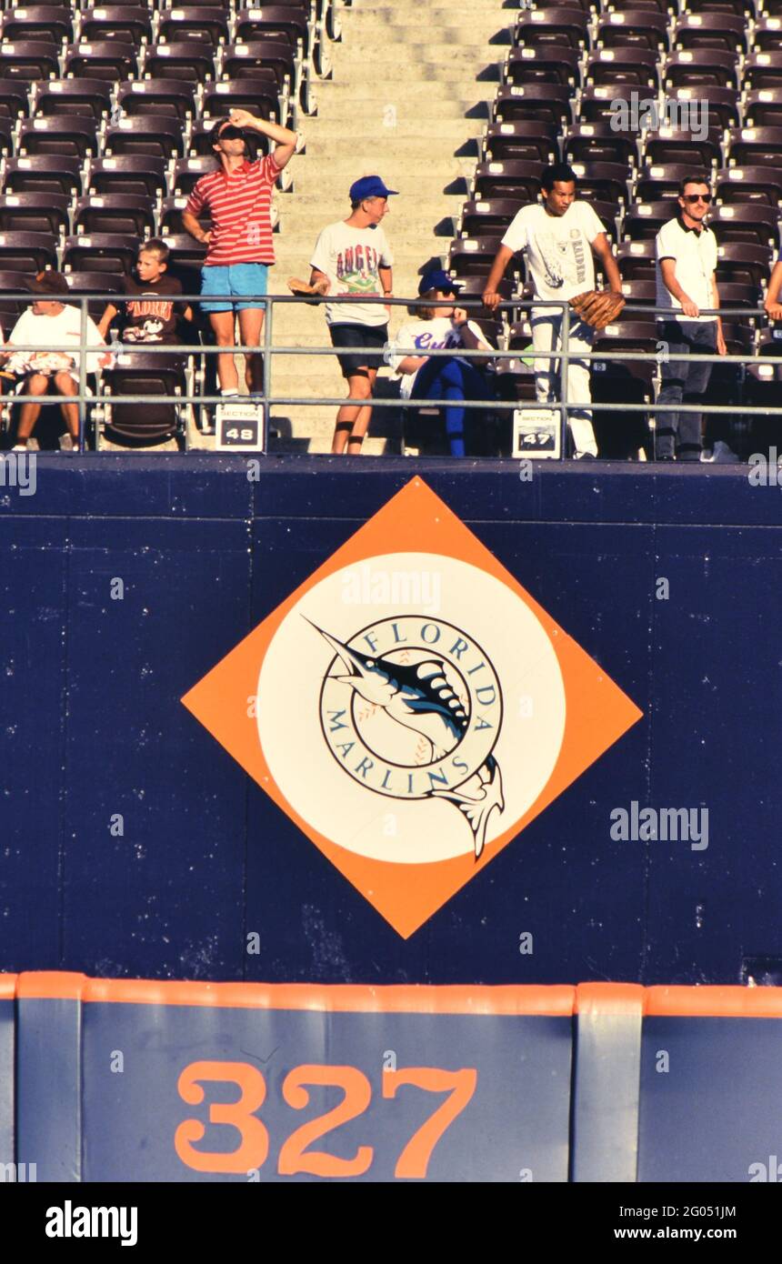 Baseball fans at a major league baseball stadium in the outfield stands