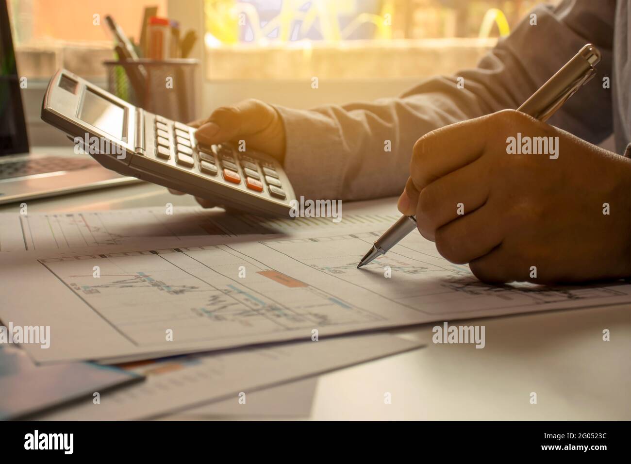 Business people reviewing reports, financial documents for analysis of financial information, work concept Stock Photo