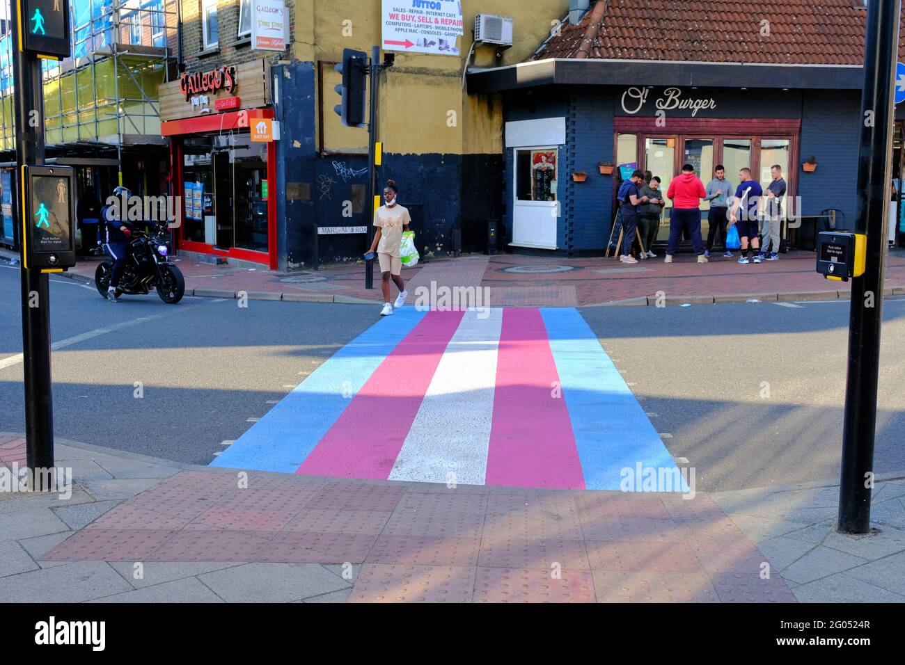 Sutton, Surrey, UK.  The first pedestrian crossing point in the UK painted in the transgender flag colours was unveiled in the south London town. Stock Photo