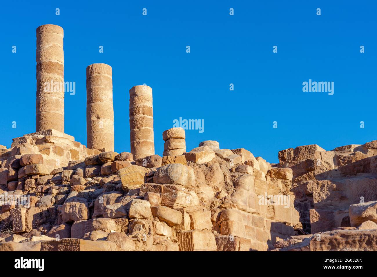 Colonnade with columns installed at great temple, on a clear summer day with blue sky, archaeological site of petra, jordan Stock Photo