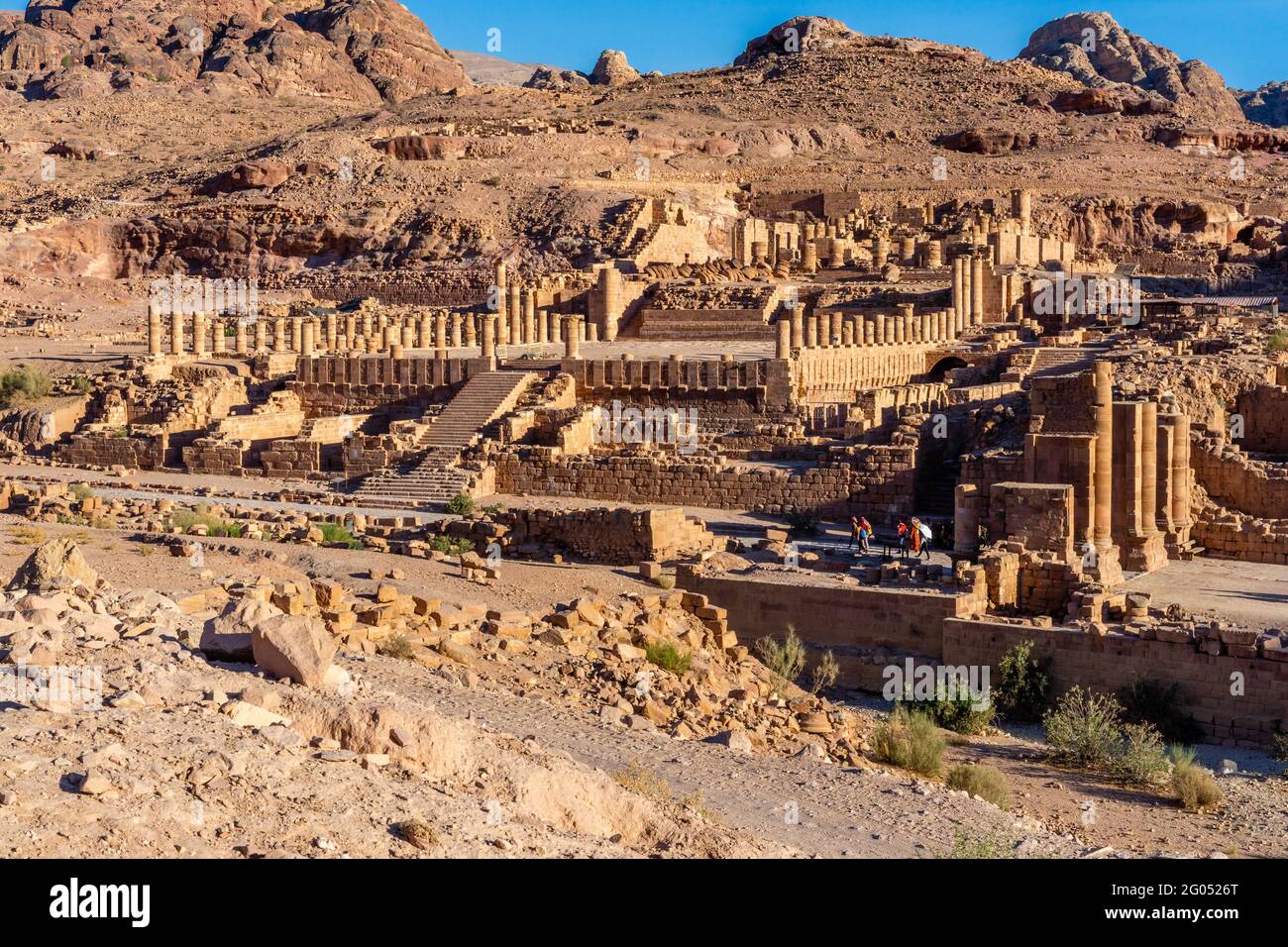 Top view of temenos gate and great temple with rock formations in background at archaeological site of petra, jordan Stock Photo