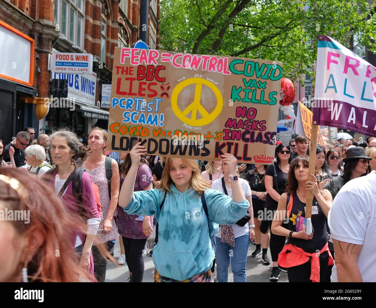 London, UK. 29/05/21.  A young person protests against government imposed Covid restrictions and perceived BBC bias. Stock Photo