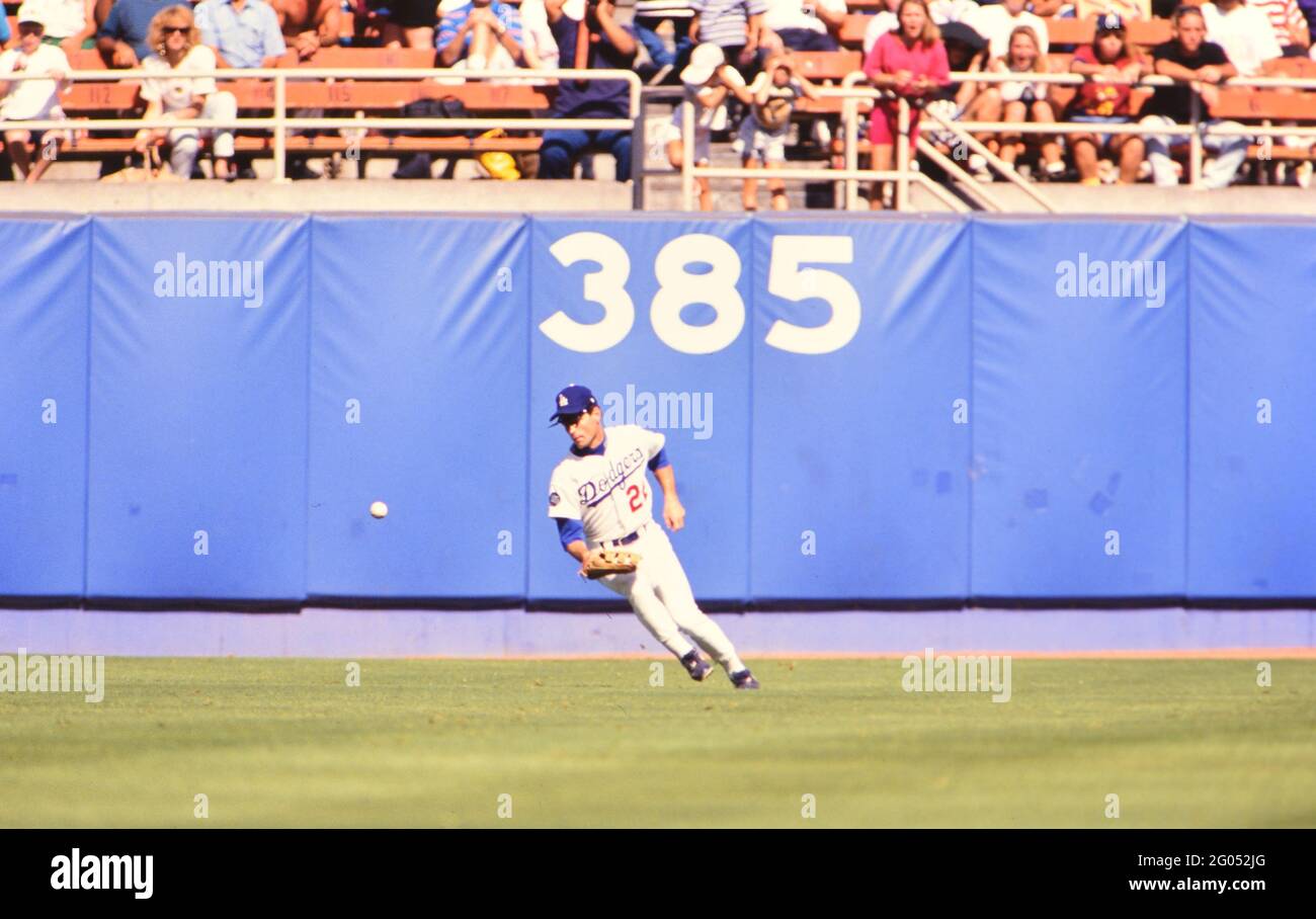 Los Angeles baseball player Brett Butler fielding a ball in the