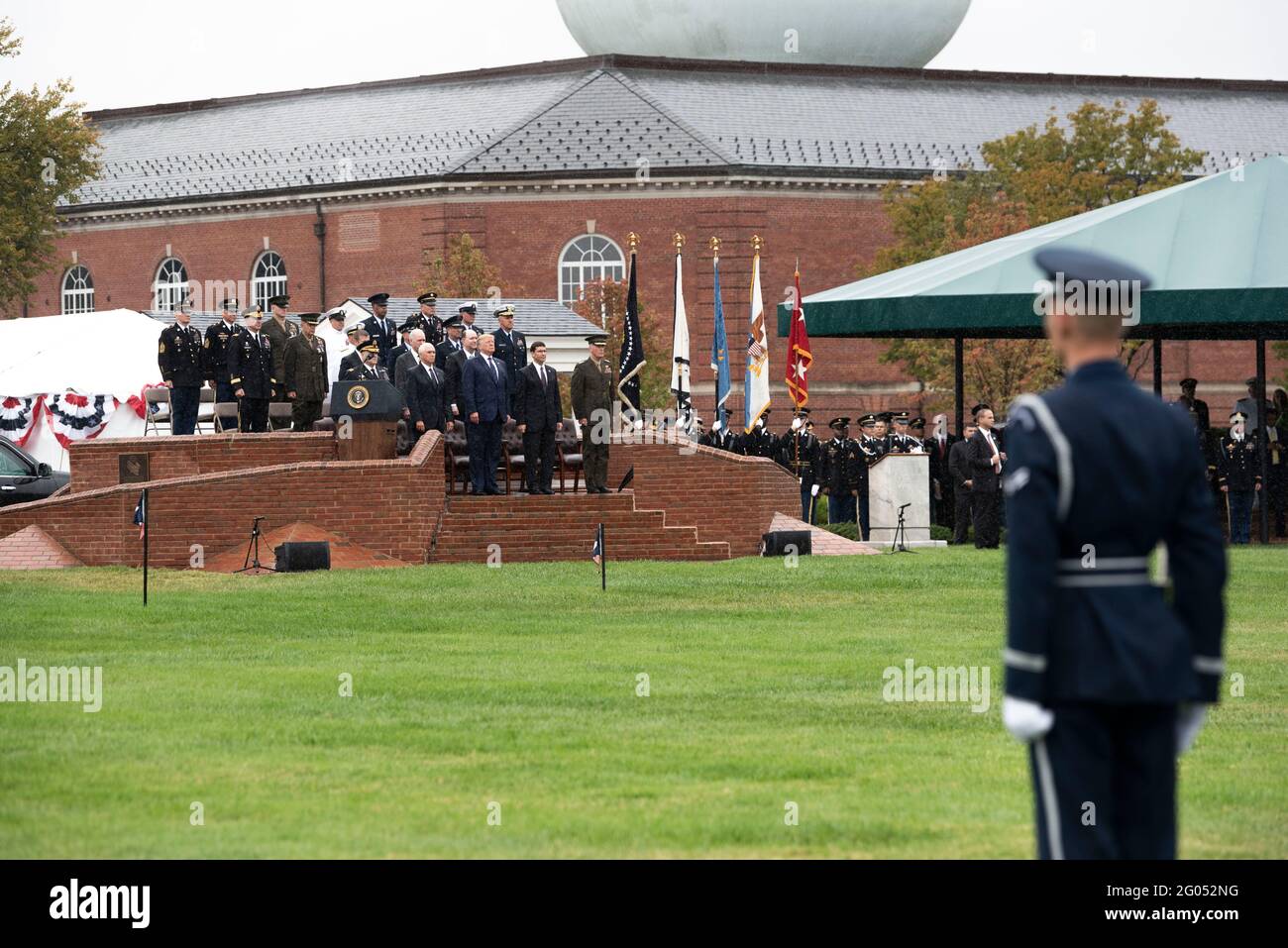 Reportage:  President Donald J. Trump, Vice President Michael Pence, Defense Secretary Mark Esper and outgoing Joint Chiefs Chairman Marine Corps Gen. Joseph F. Dunford take part in an Armed Forces Welcome Ceremony for the 20th chairman of the Joint Chiefs of Staff, Army Gen. Mark A. Milley, Joint Base Myer-Henderson Hall, Virginia, Sept. 30, 2019. Stock Photo