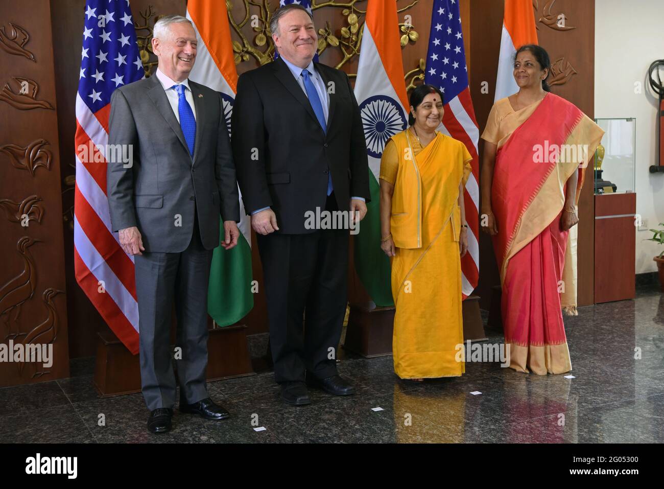 Reportage:  (from left) U.S. Secretary of Defense James N. Mattis, U.S. Secretary of State Michael Pompeo, Indian Minister of External Affairs Sushma Swaraj and Indian Defense Minister Nirmala Sitharaman pose for the cameras, at the Ministry of Foreign Affairs Jawaharlal Nehru Bhawan, New Delhi, India, Sept. 6, 2018. Mattis and Pompeo met with their Indian counterparts for the first-ever U.S.-India ministerial dialogue to re-affirm their commitment to an enhanced partnership. Stock Photo
