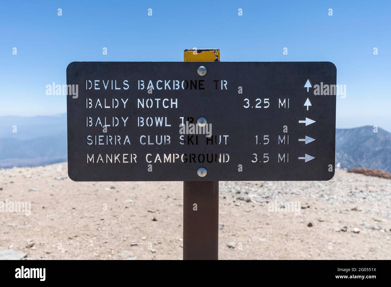 Mt Baldy, California, USA - May 23, 2021:  View of Devils Backbone trail sign on the summit of Mt Baldy in the San Gabriel Mountains. Stock Photo