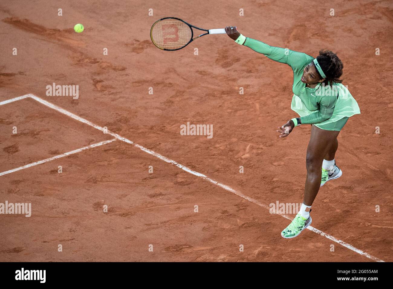 Paris, France. 31st May, 2021. Serena Williams of the United States serves the ball during the women's first round match against Irina-Camelia Begu of Romania at the French Open tennis tournament at Roland Garros in Paris, France, May 31, 2021. Credit: Aurelien Morissard/Xinhua/Alamy Live News Stock Photo