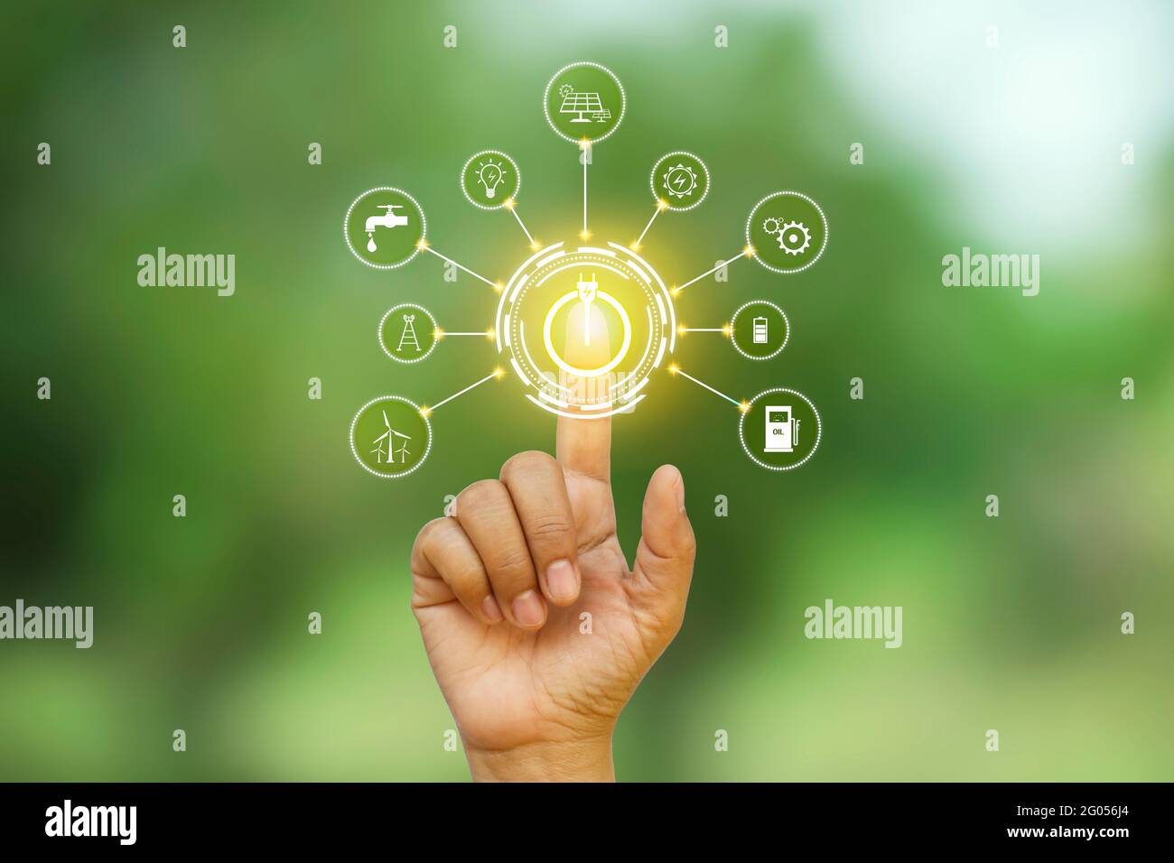 Businessmen click on the icon of the switch to save energy, including the icon about energy, energy saving ideas and eco-friendly energy consumption. Stock Photo