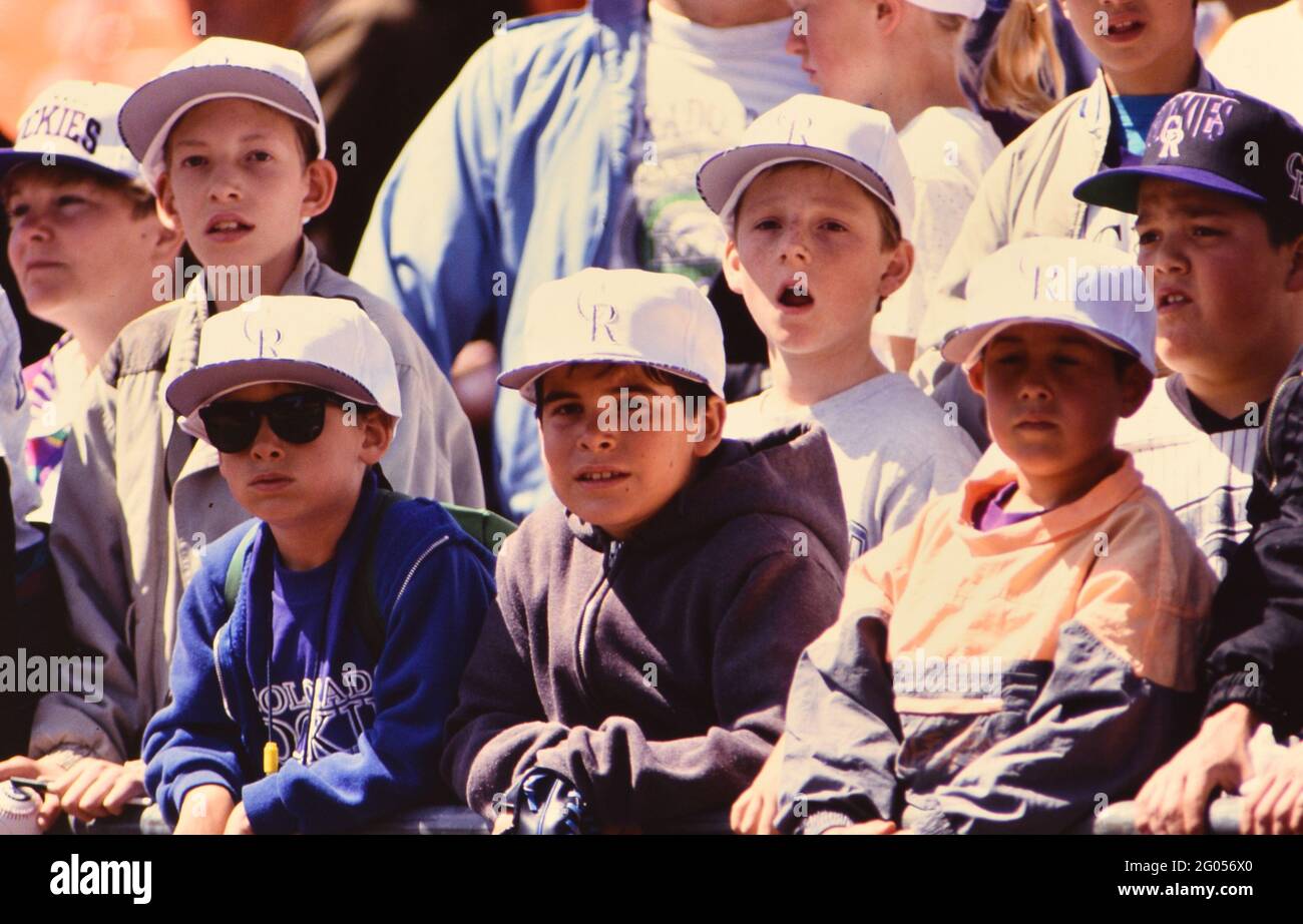 Young baseball fans in the stands of a ballpark Please credit