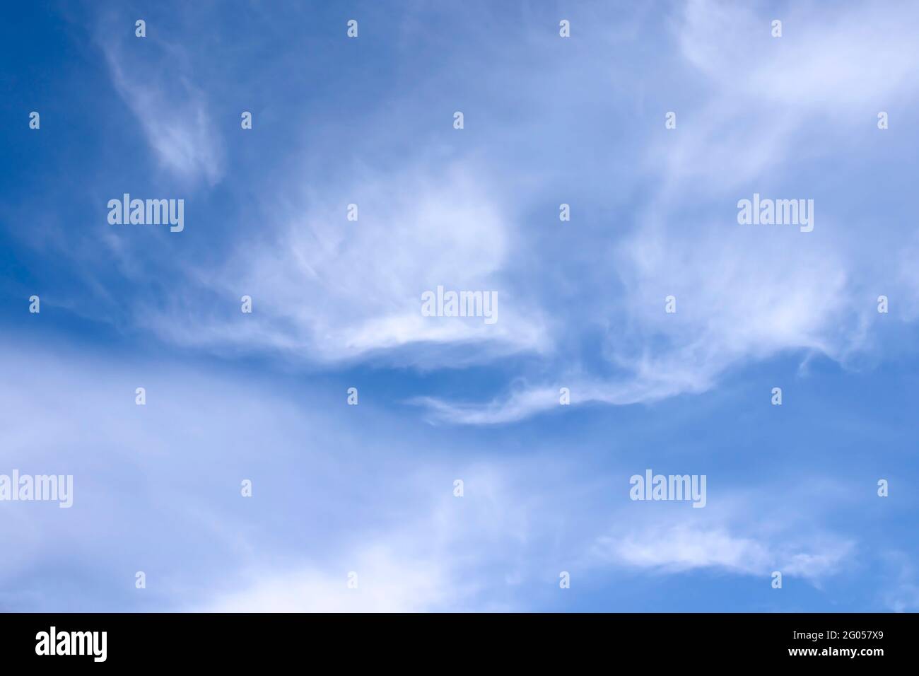 Blurred white clouds on the sky background. Stock Photo