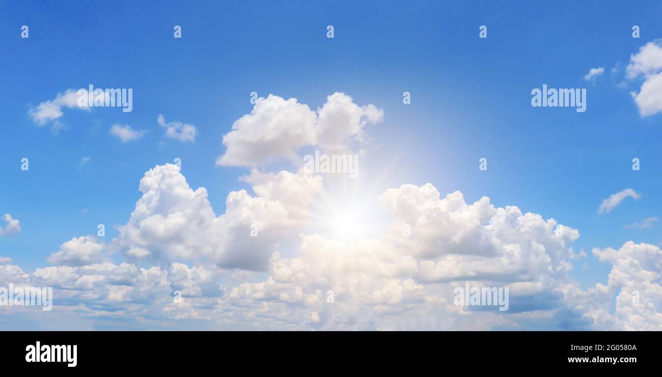 Cumulus white clouds floating in blue sky, concept for design to make wallpaper. Stock Photo