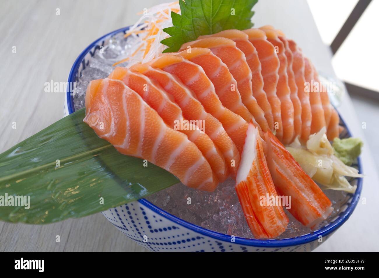 Salmon slice or salmon sashimi in Japanese style fresh serve on ice