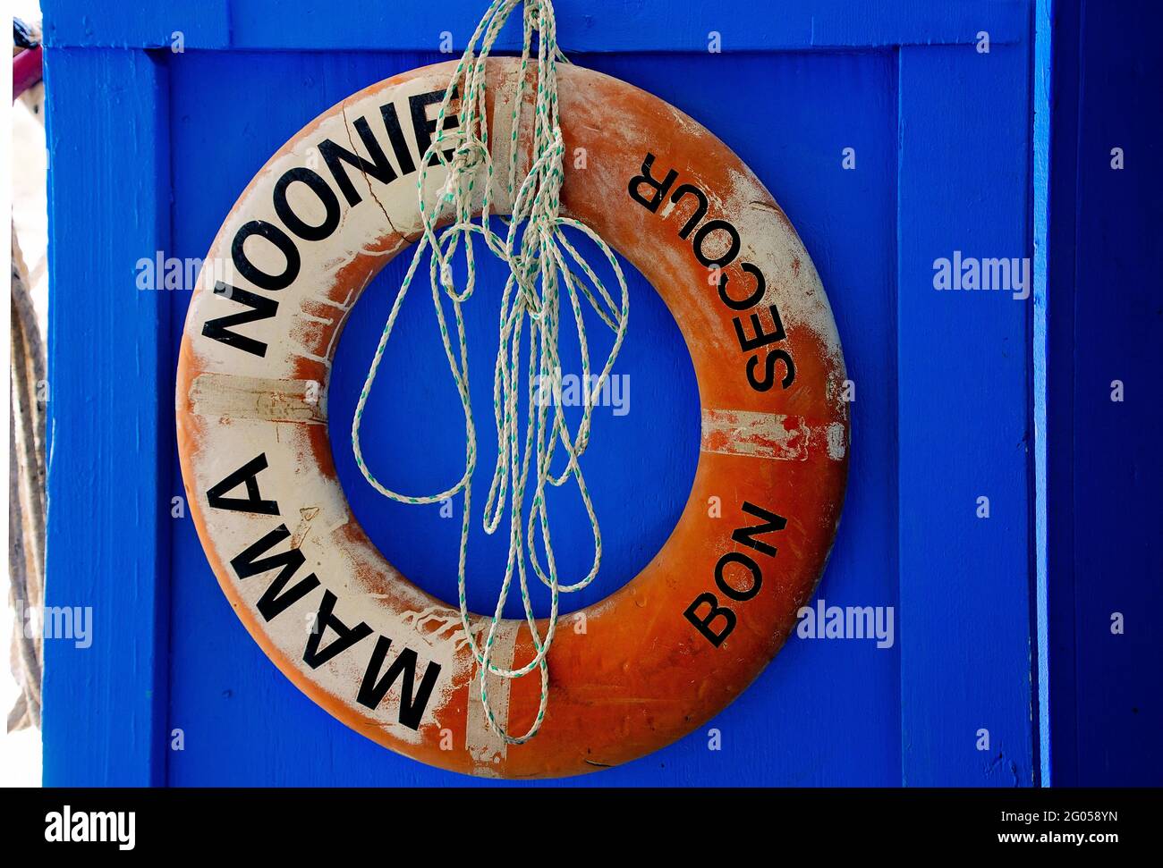 A life preserver for Mama Noonie shrimp boat hangs on the wall at Billy’s Seafood, May 27, 2021, in Bon Secour, Alabama. Stock Photo