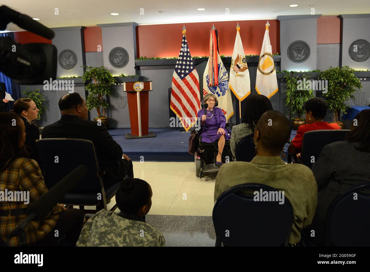 Reportage:   World War II Army veteran 106-year-old Alyce Dixon talks about her experiences as a member of the Women's Army Corps, during a women's history month event at the Pentagon, March 31, 2014. Dixon was honored with a Department of the Army Lifetime Achievement Women of Character, Courage and Commitment award, and a Women's History Month certificate of appreciation. During World War II, Dixon served in Europe as a member of the 6888th Central Postal Directory Battalion. The 6888th was the only unit of African-American women in the WAC to serve overseas in England and France during Worl Stock Photo