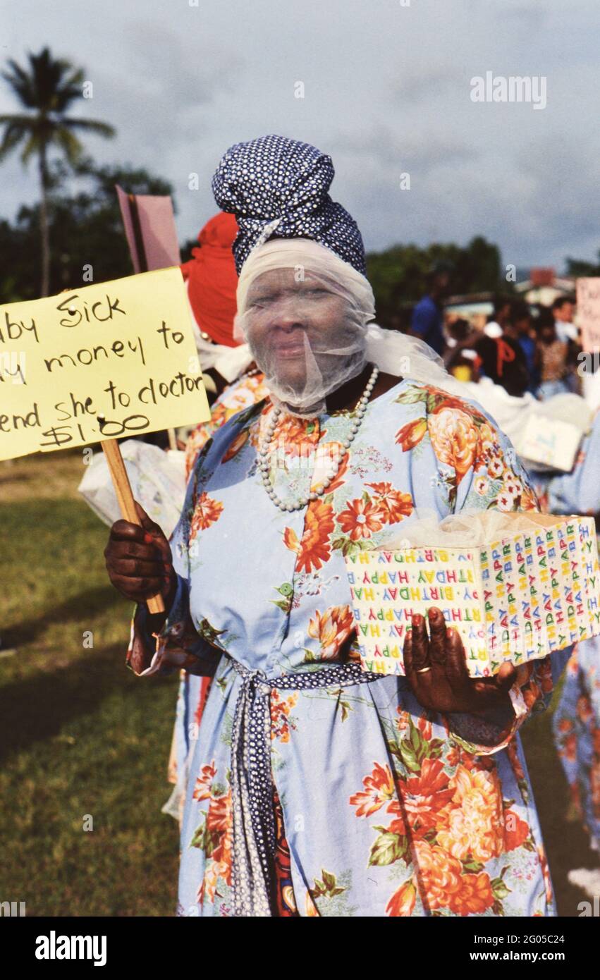 1990s Trinidad and Tobago - Tobago Heritage Festival performer begging for money to bury her baby ca. late 1990s Stock Photo