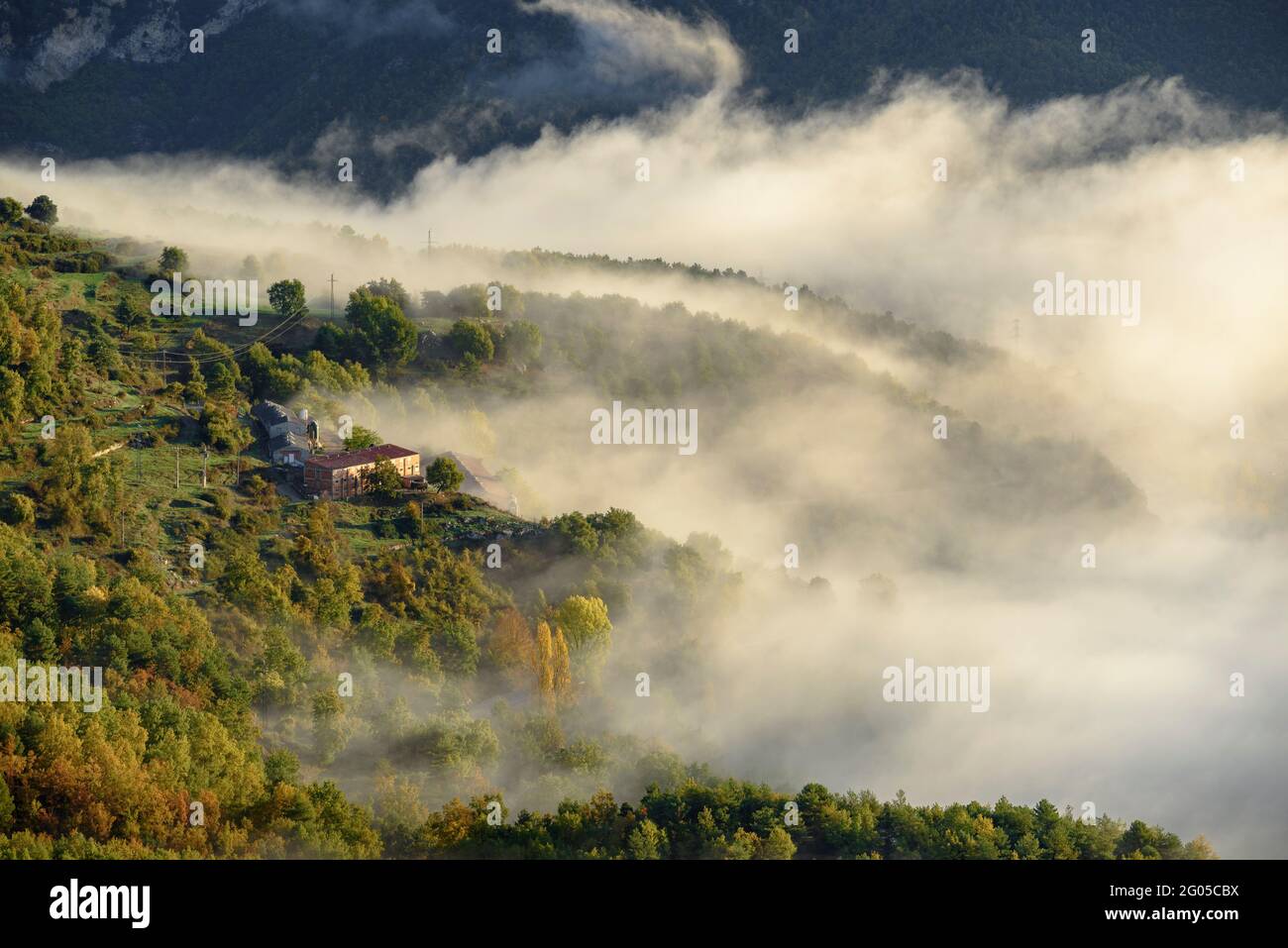 Morning fog in the Llobregat river valley over the Pantà de la Baells reservoir (Berguedà, Barcelona, Catalonia, Spain, Pyrenees) Stock Photo