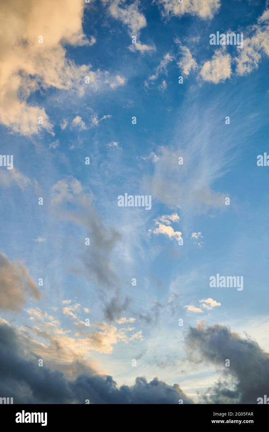 Blue sky at sunset with dramatics clouds Stock Photo