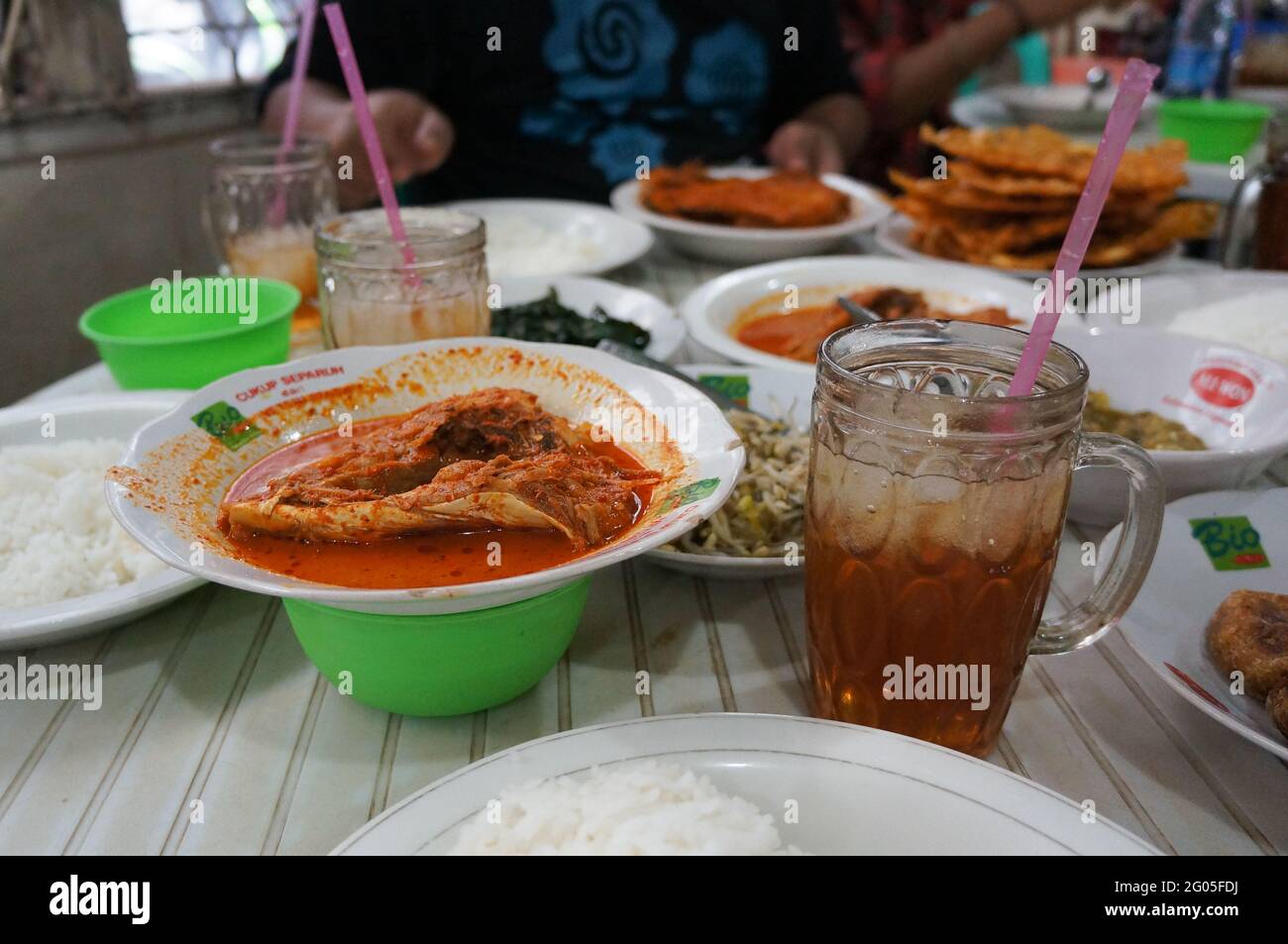 A plate of fish curry or known as gulai ikan at Warung Mak Etek Pontianak, Indonesia Stock Photo