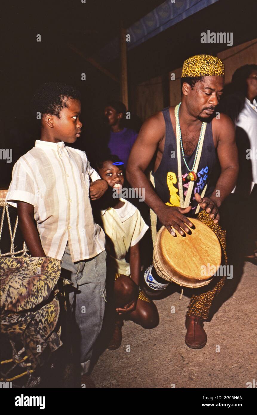 1990s Trinidad and Tobago - Man playing drum in Tobago as young ...