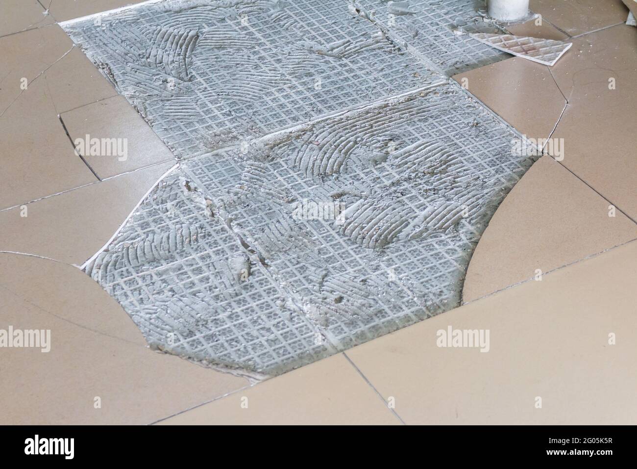 Cracked floor ceramic tiles background Stock Photo Alamy