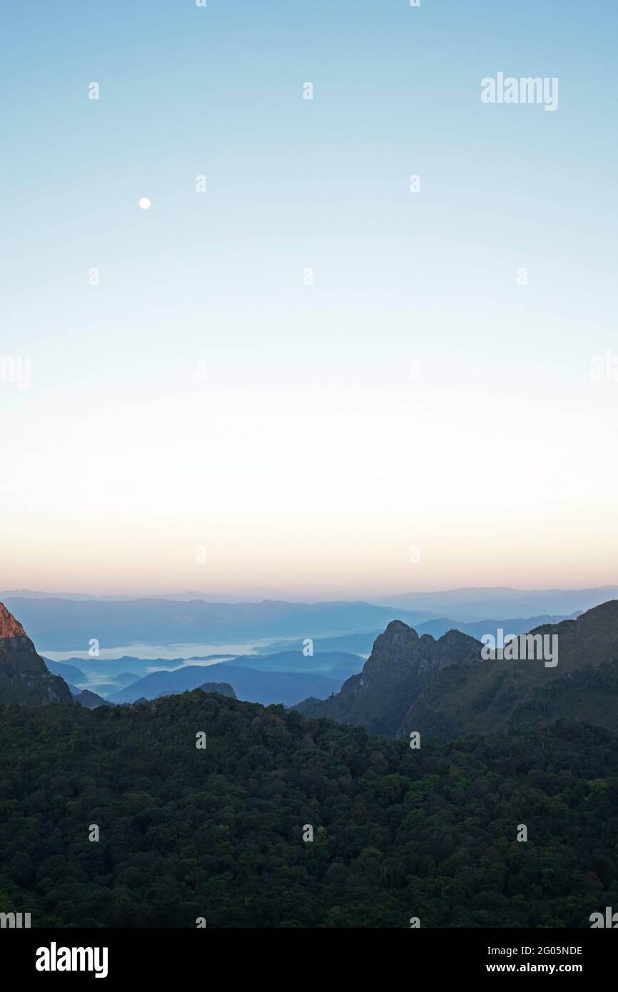 Natural landscape of sunrise view with mountain range and cloudy blue ...