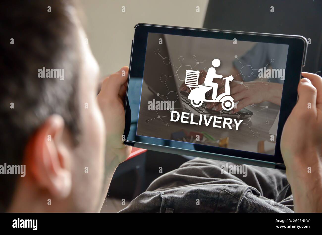 Delivery concept on a tablet Stock Photo - Alamy